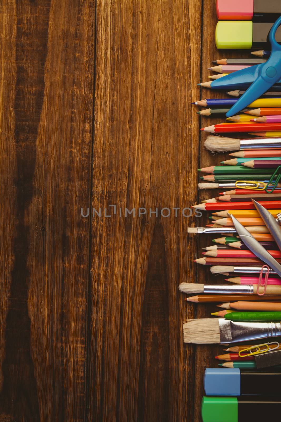 Art supplies on desk with copy space by Wavebreakmedia