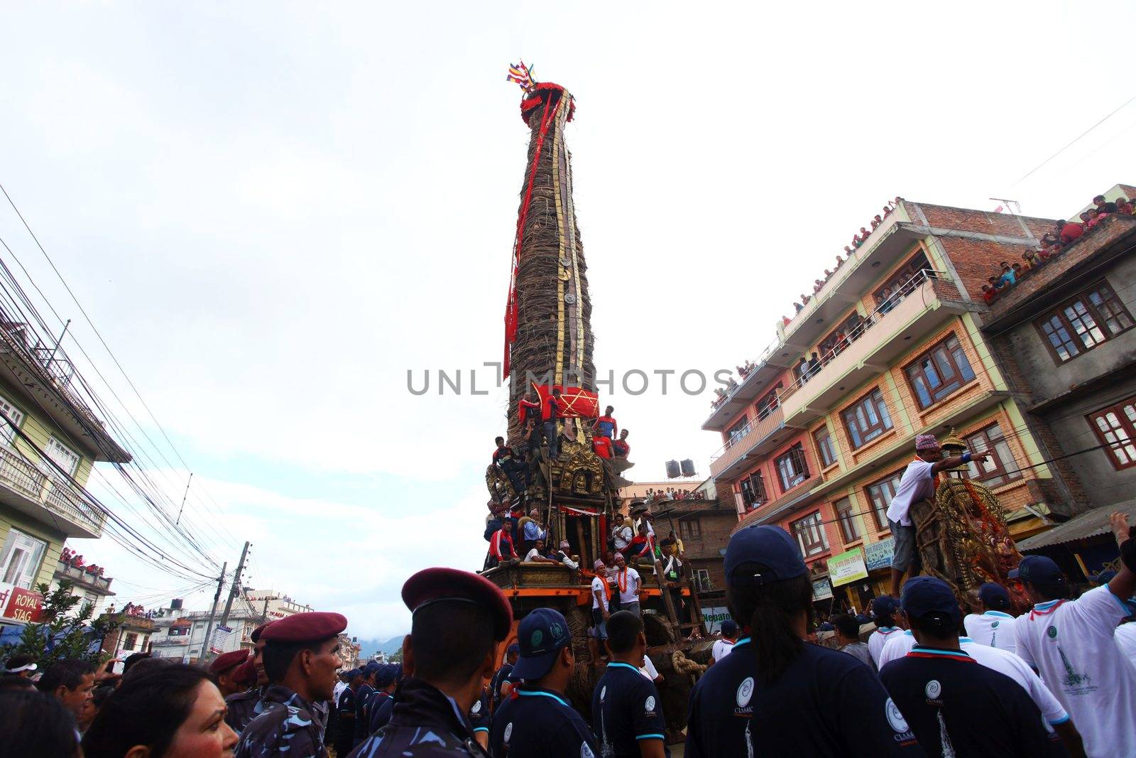 NEPAL, Patan: The restored chariot makes its way through Patan, Nepal as Hindu and Buddhist devotees celebrate the festival of rain god Rato Machindranath on September 22, 2015. The festival takes place each April, but was delayed this year after a devastating earthquake damaged the chariot that devotees pull through the area in the hope of securing a good harvest.