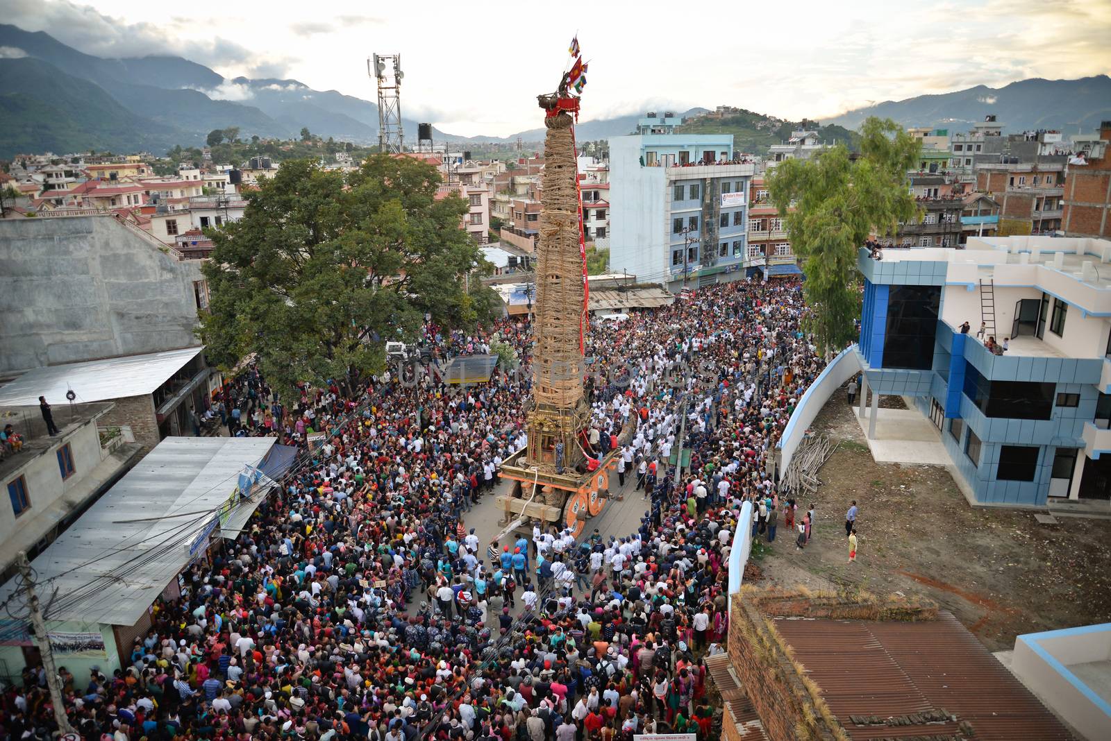 NEPAL, Patan: The restored chariot makes its way through Patan, Nepal as Hindu and Buddhist devotees celebrate the festival of rain god Rato Machindranath on September 22, 2015. The festival takes place each April, but was delayed this year after a devastating earthquake damaged the chariot that devotees pull through the area in the hope of securing a good harvest.