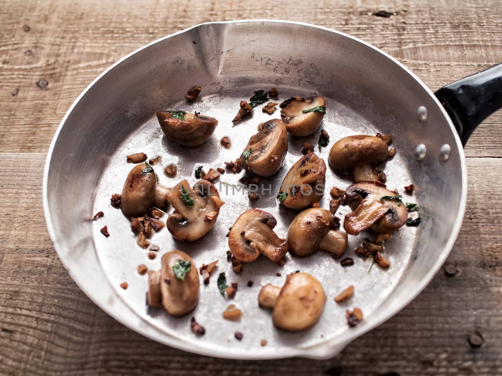 close up of rustic pan sauteed mushroom