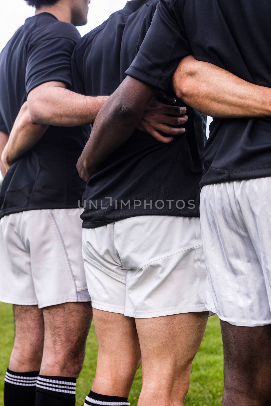 Rugby players standing together before match by Wavebreakmedia