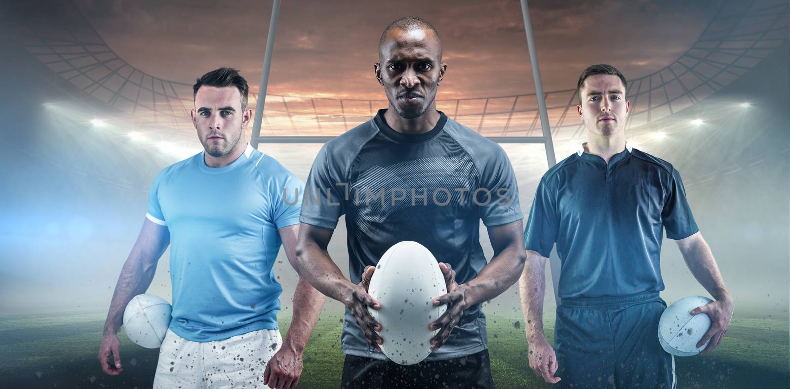 Rugby player holding a rugby ball against rugby stadium