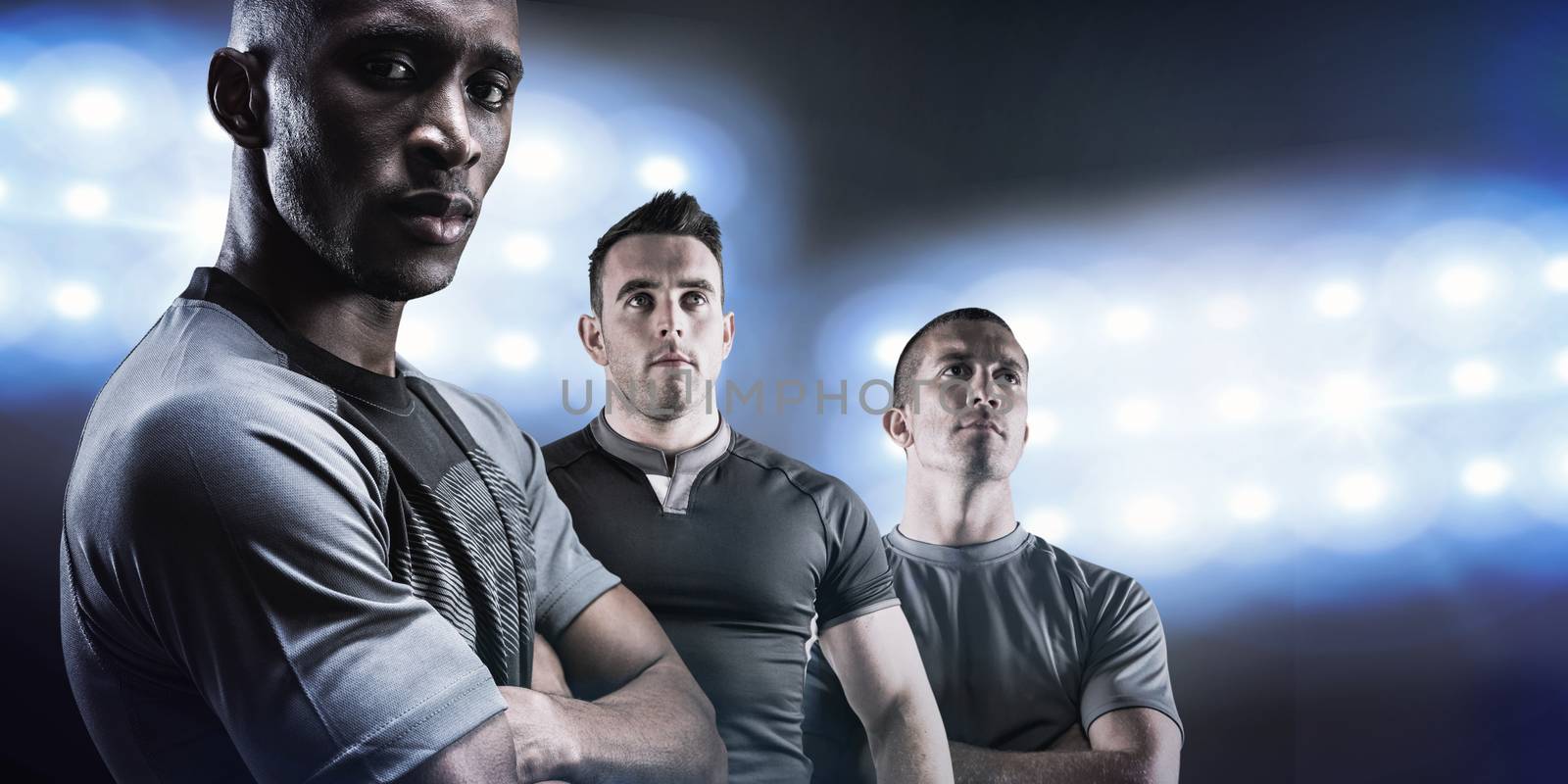 Composite image of portrait of confident athlete with arms crossed by Wavebreakmedia