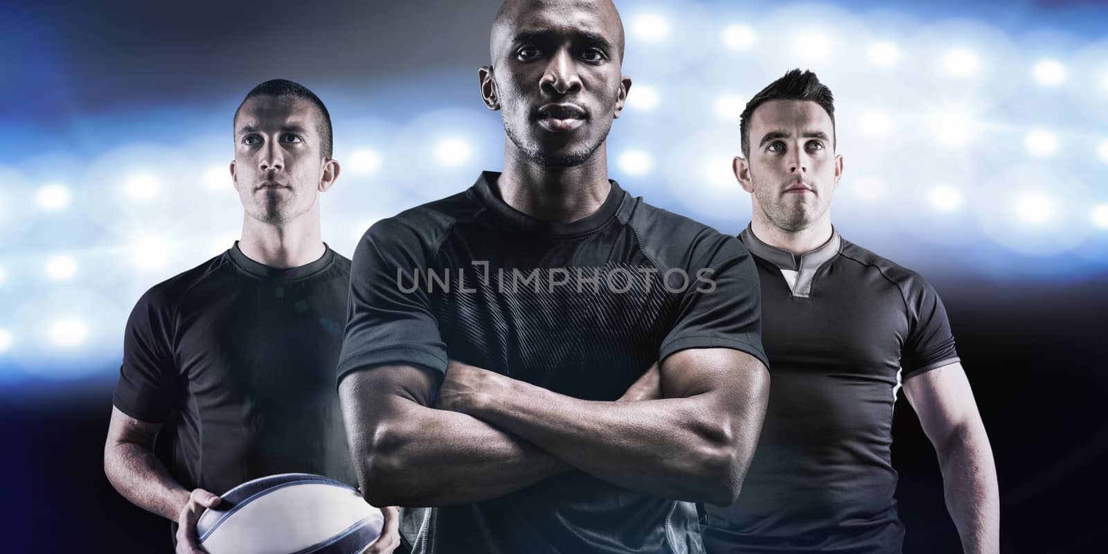 Composite image of portrait of confident rugby player with arms crossed by Wavebreakmedia