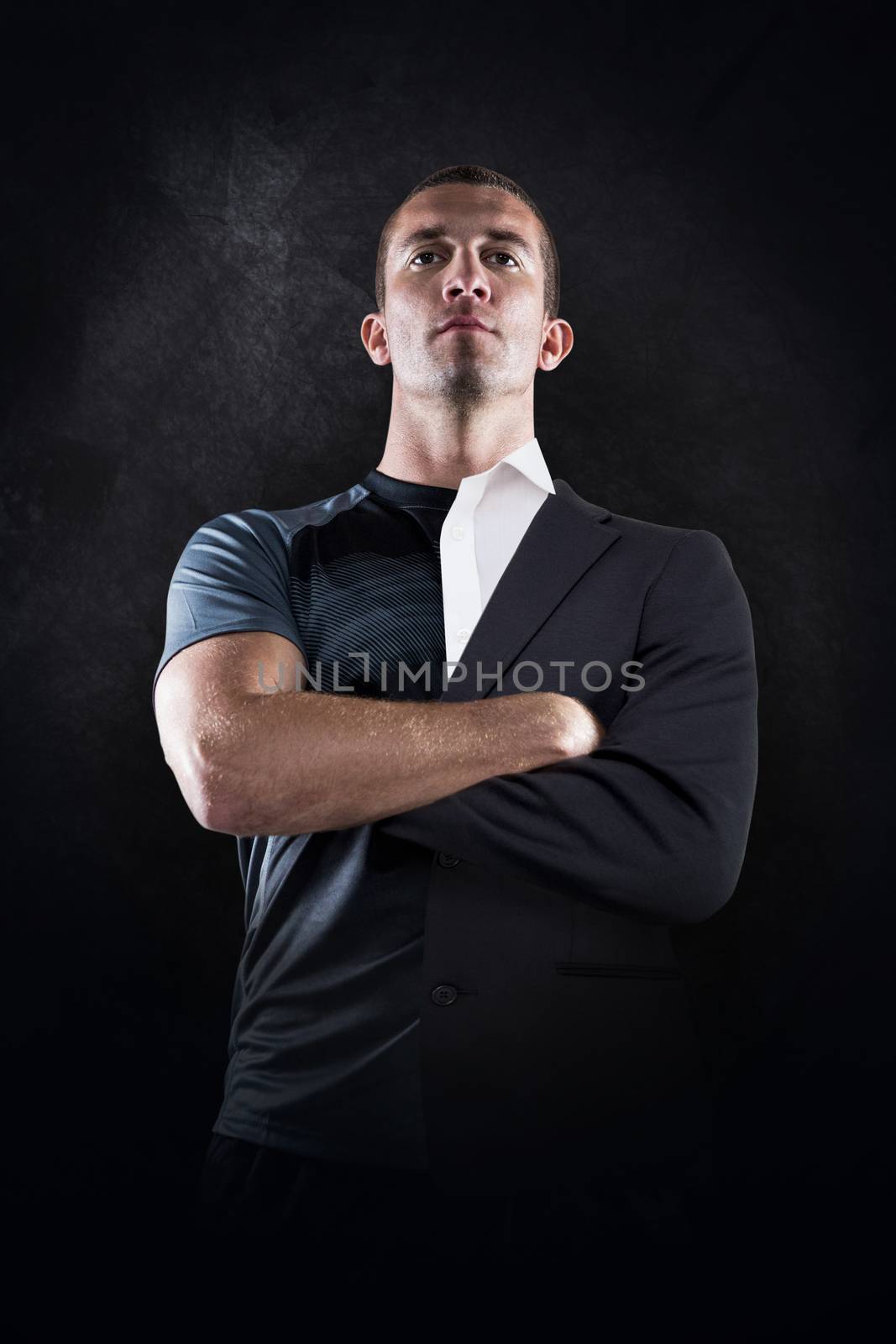 Composite image of confident rugby player with arms crossed by Wavebreakmedia