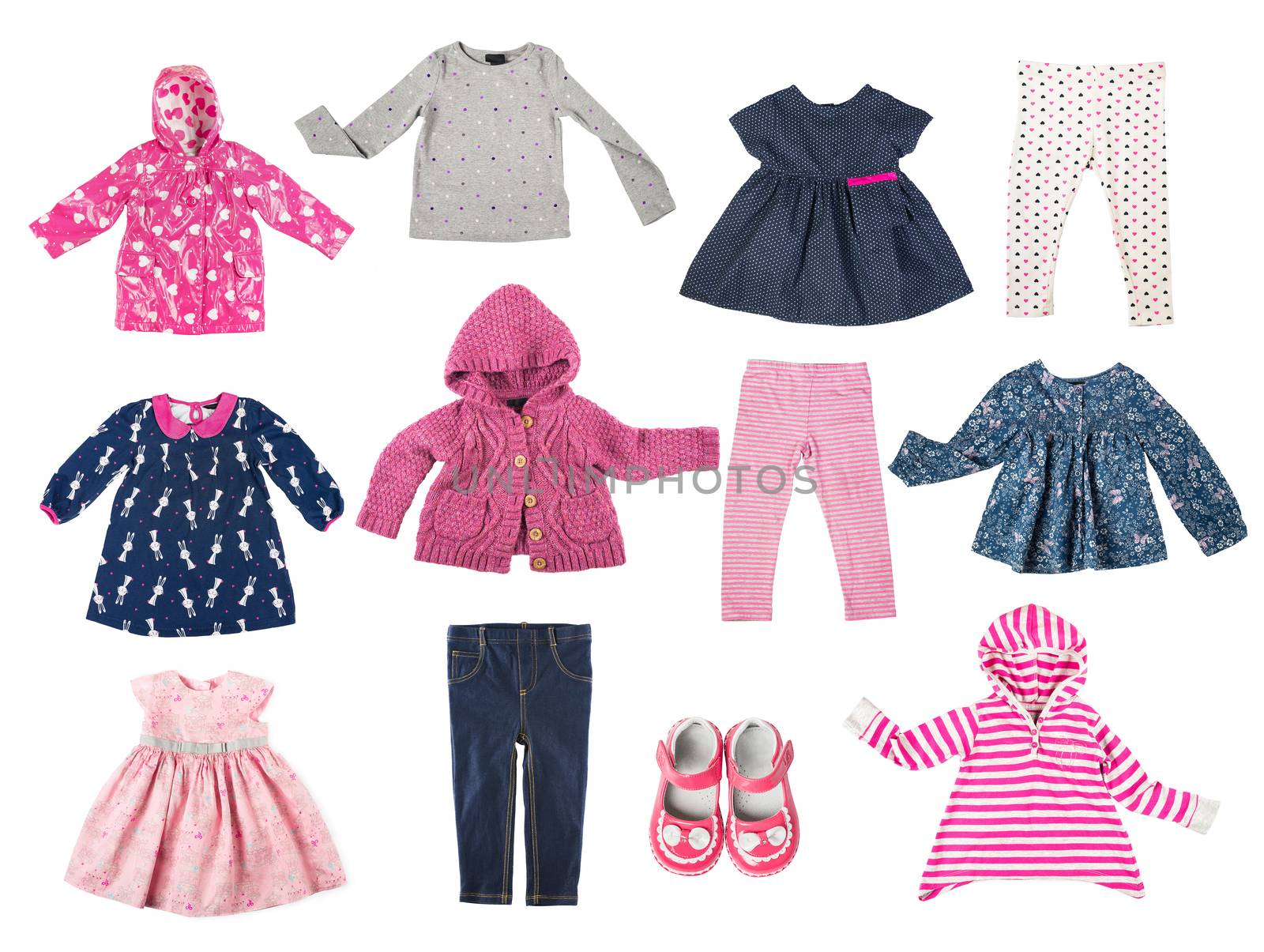 Set of different children's clothes, shirts, jacket, shirt, pants, shoes, dresses, baby's wardrobe isolated on white background