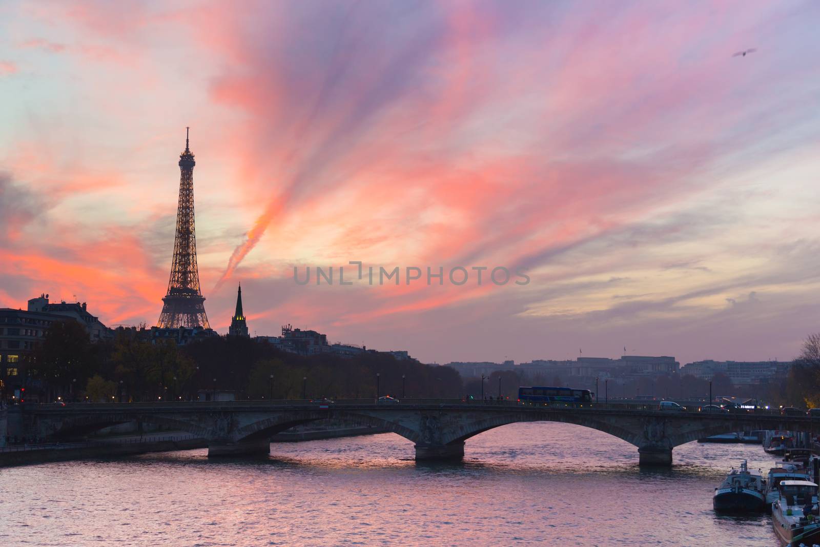 Sunset over Eiffel Tower and Seine river. by kasto