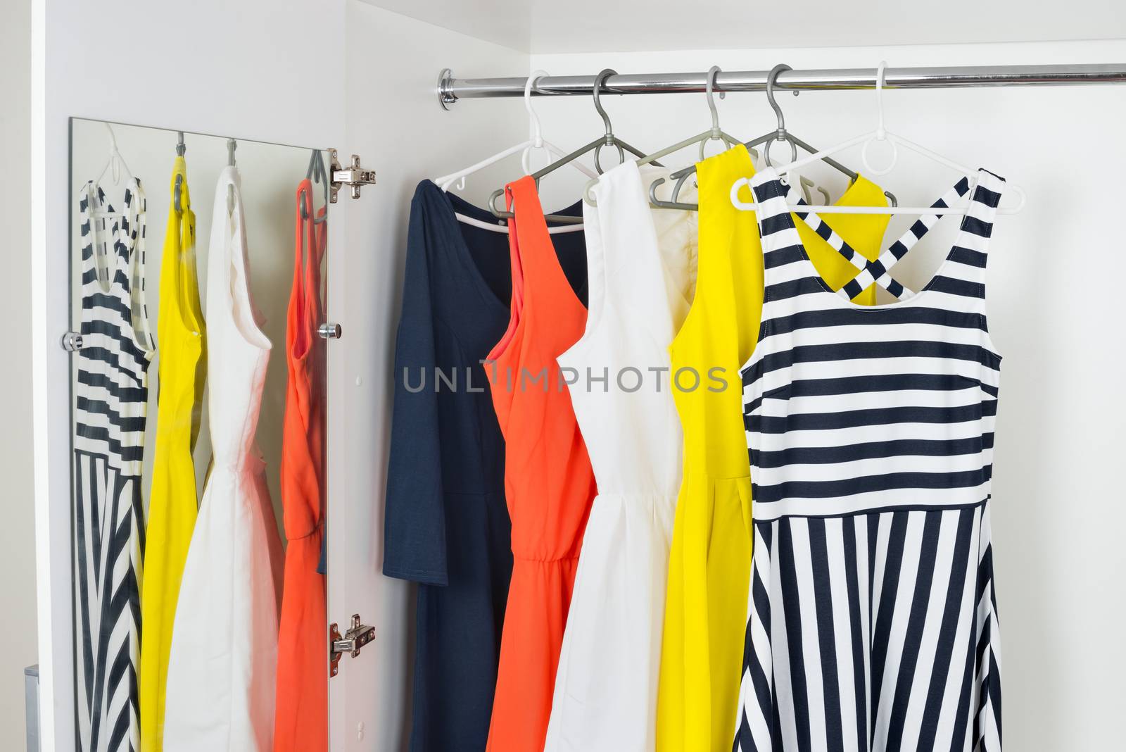  series of bright modern fashion women dresses on hangers by iprachenko