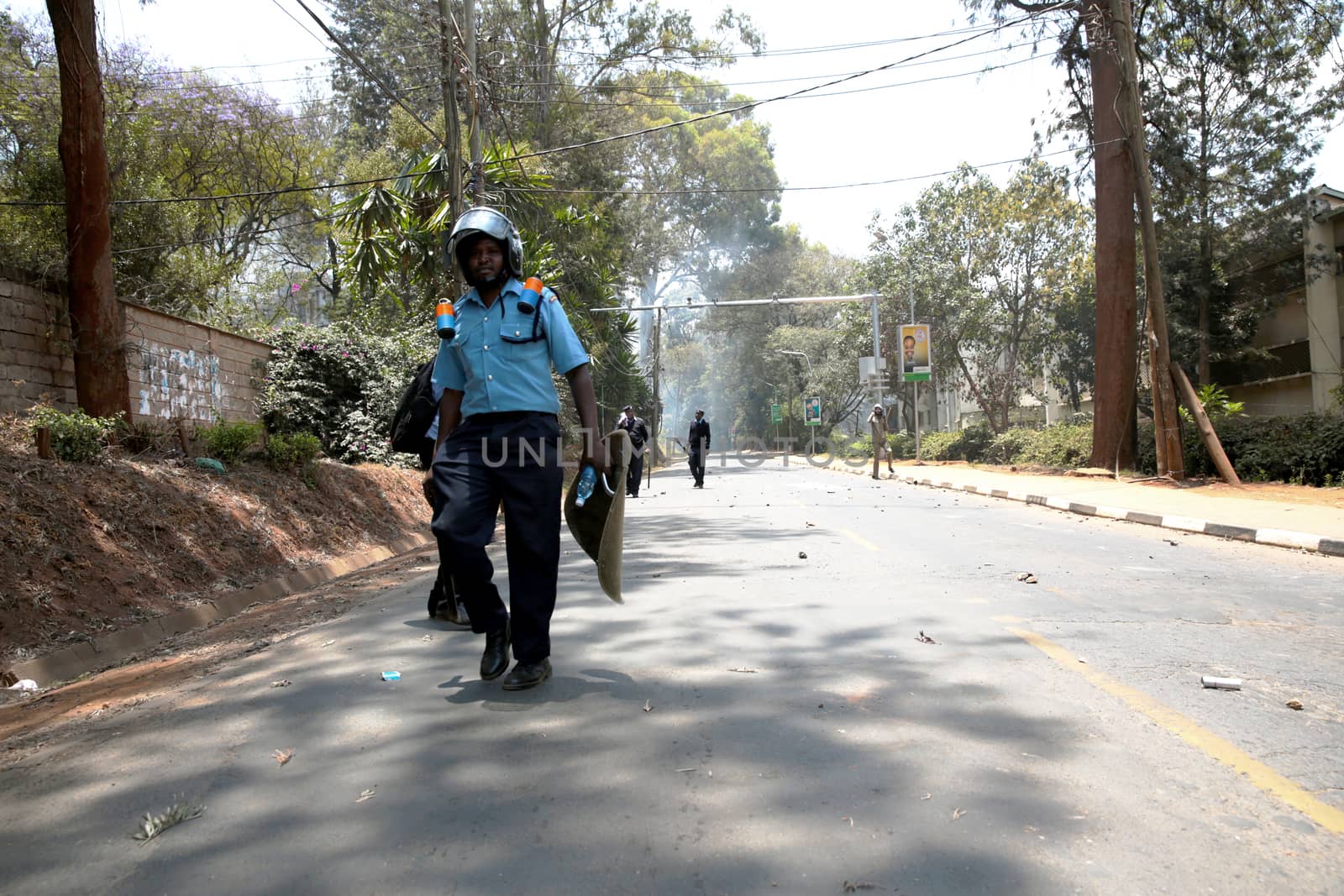 KENYA, Nairobi: Clashes erupt in Nairobi, Kenya on September 22, 2015 after police officials attempted to forcibly disperse university students protesting delayed government loans disbursement through Higher Education Learning Board (HELB).According to our contributor, the riot police had resorted to using tear gas canisters to break up the crowds, which had blocked Haile Selassie road.