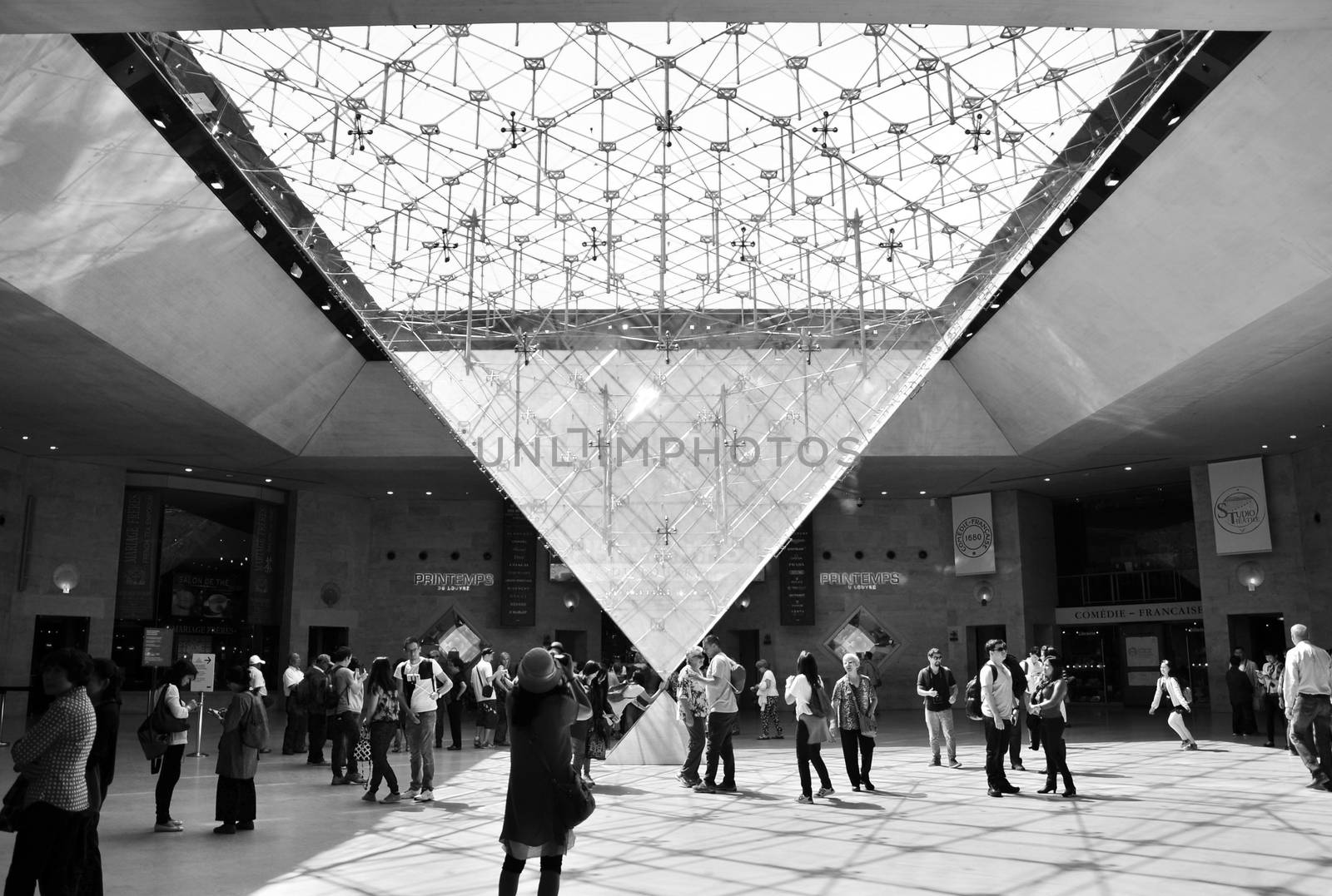Paris, France - May 13, 2015: Tourists visit Inside the Louvres  by siraanamwong