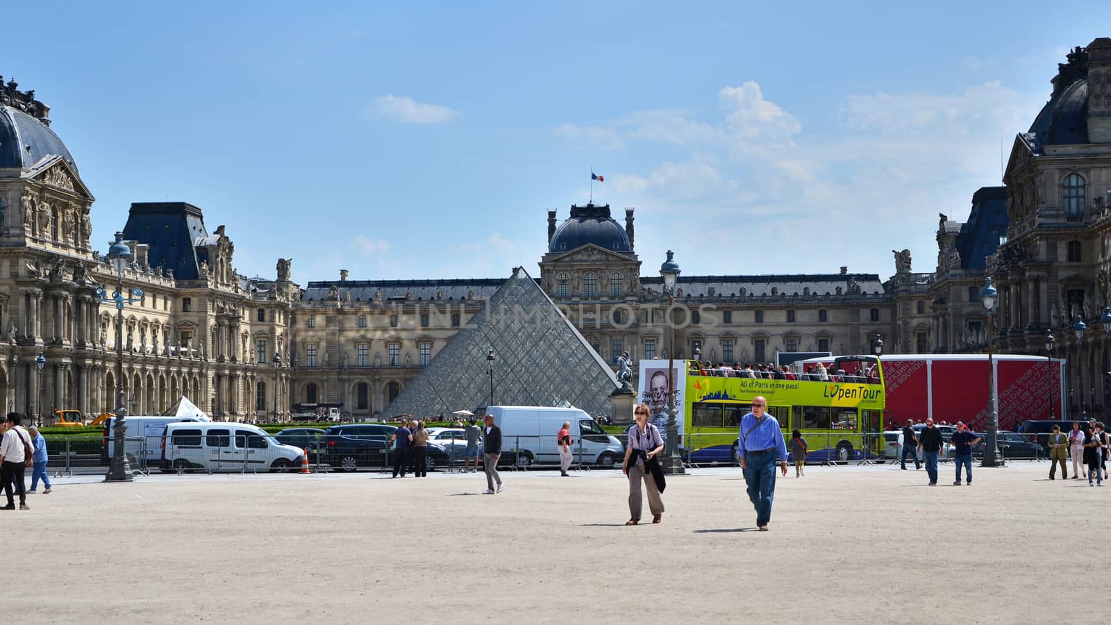 Paris, France - May 13, 2015: Tourist visit Louvre museum in Paris by siraanamwong