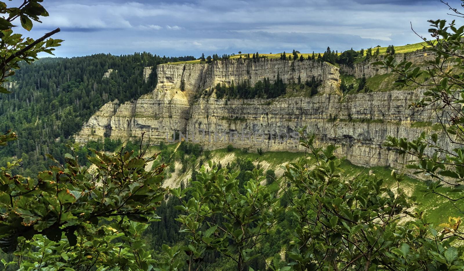 Creux-du-Van or Creux du Van rocky cirque by day, Neuchatel canton, Switzerland