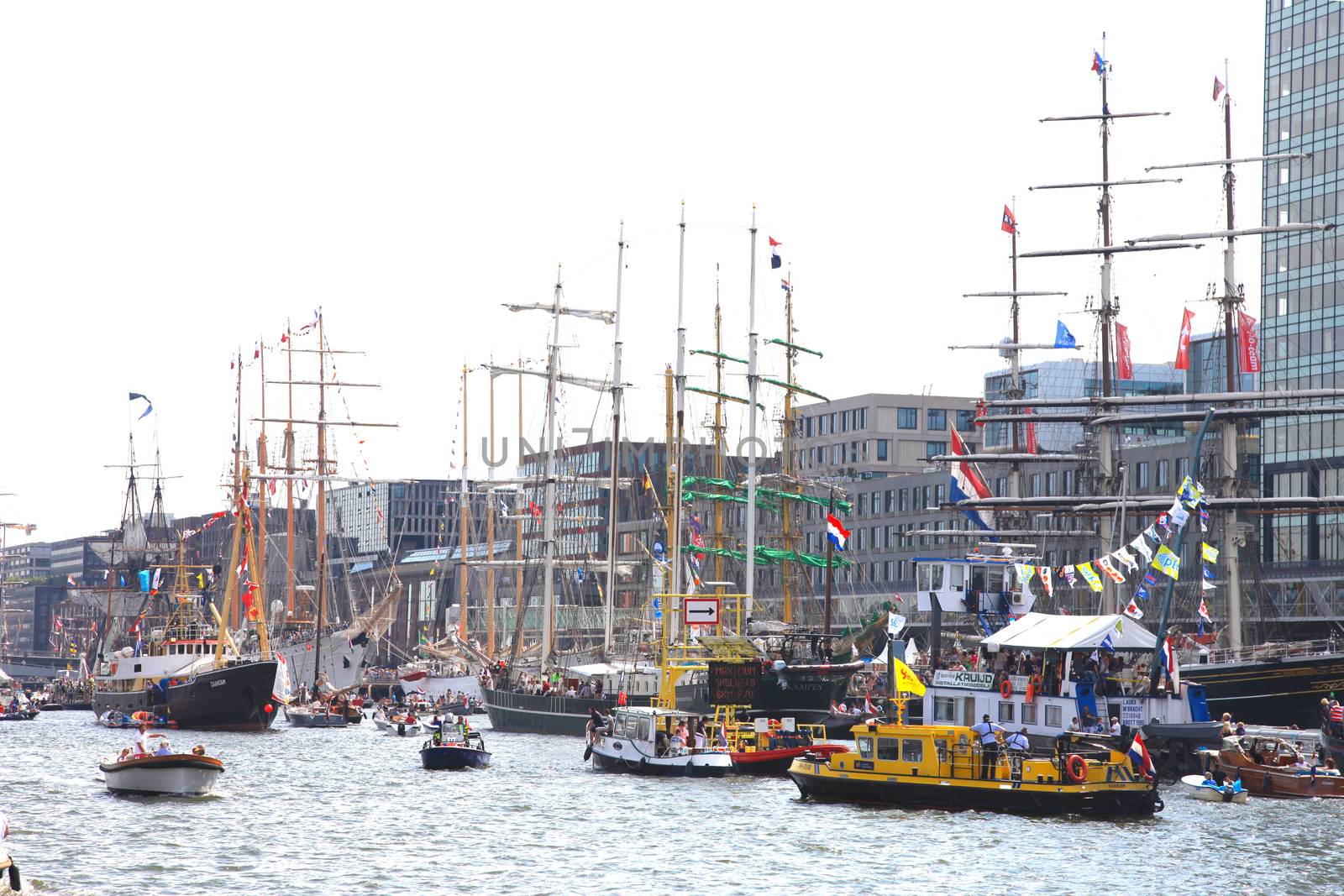 AMSTERDAM, THE NETHERLANDS - AUGUST 22, 2015: Russian tallship STS Mir in Amsterdam particiating at European large tallship event SAIL 2015. by gigra