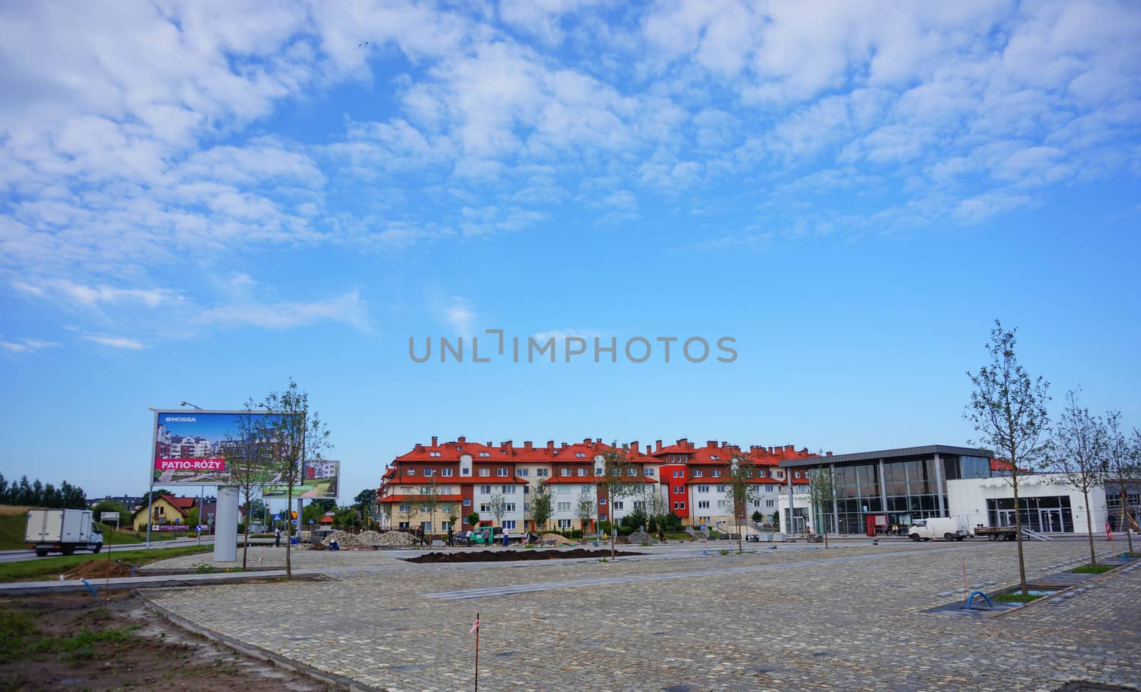 GDYNIA, POLAND - JULY 29, 2015: Construction of a new square by apartment buildings