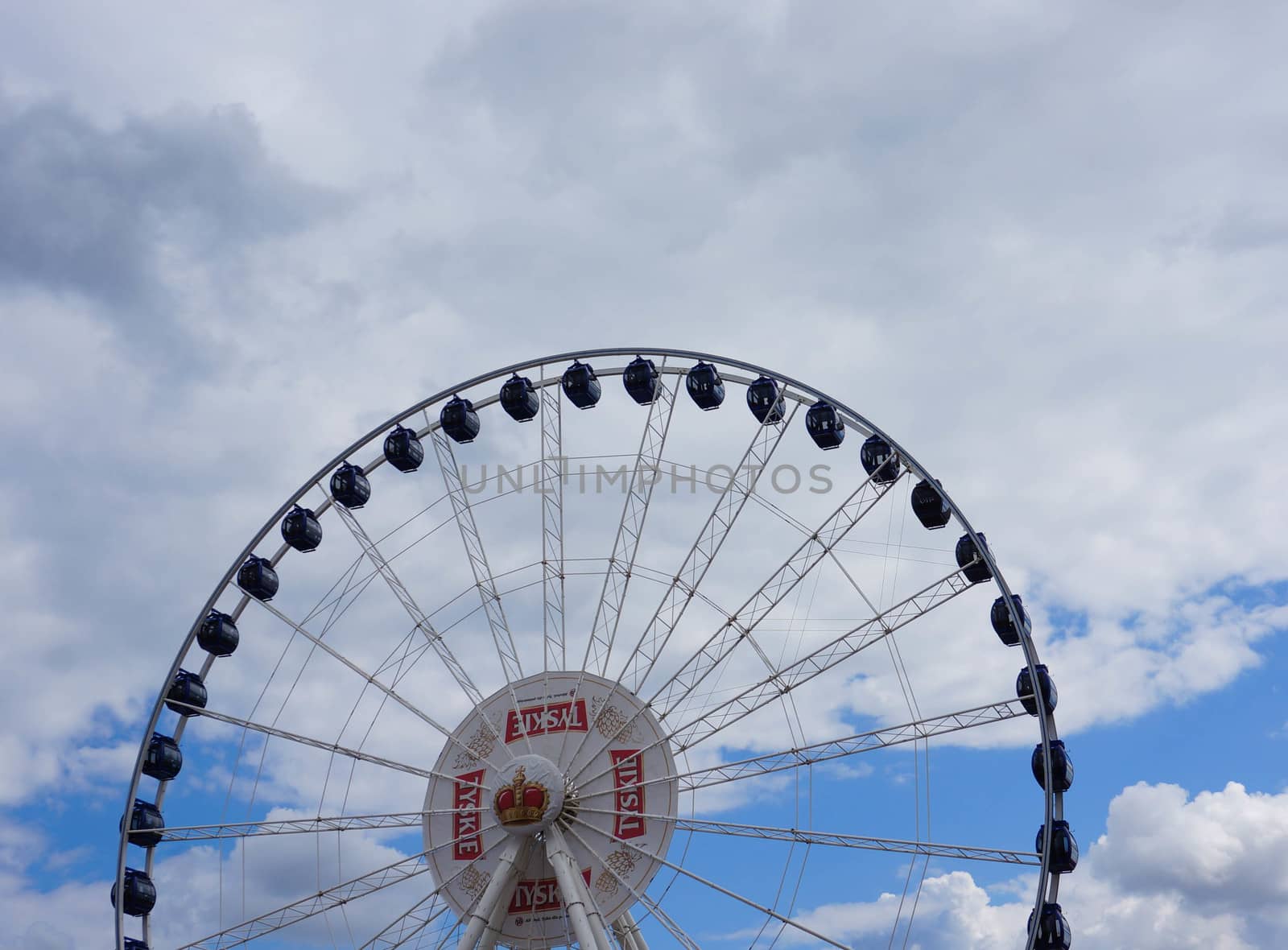 GDANSK, POLAND - JULY 29, 2015: Large fair wheel with Tyskie logo at the city center