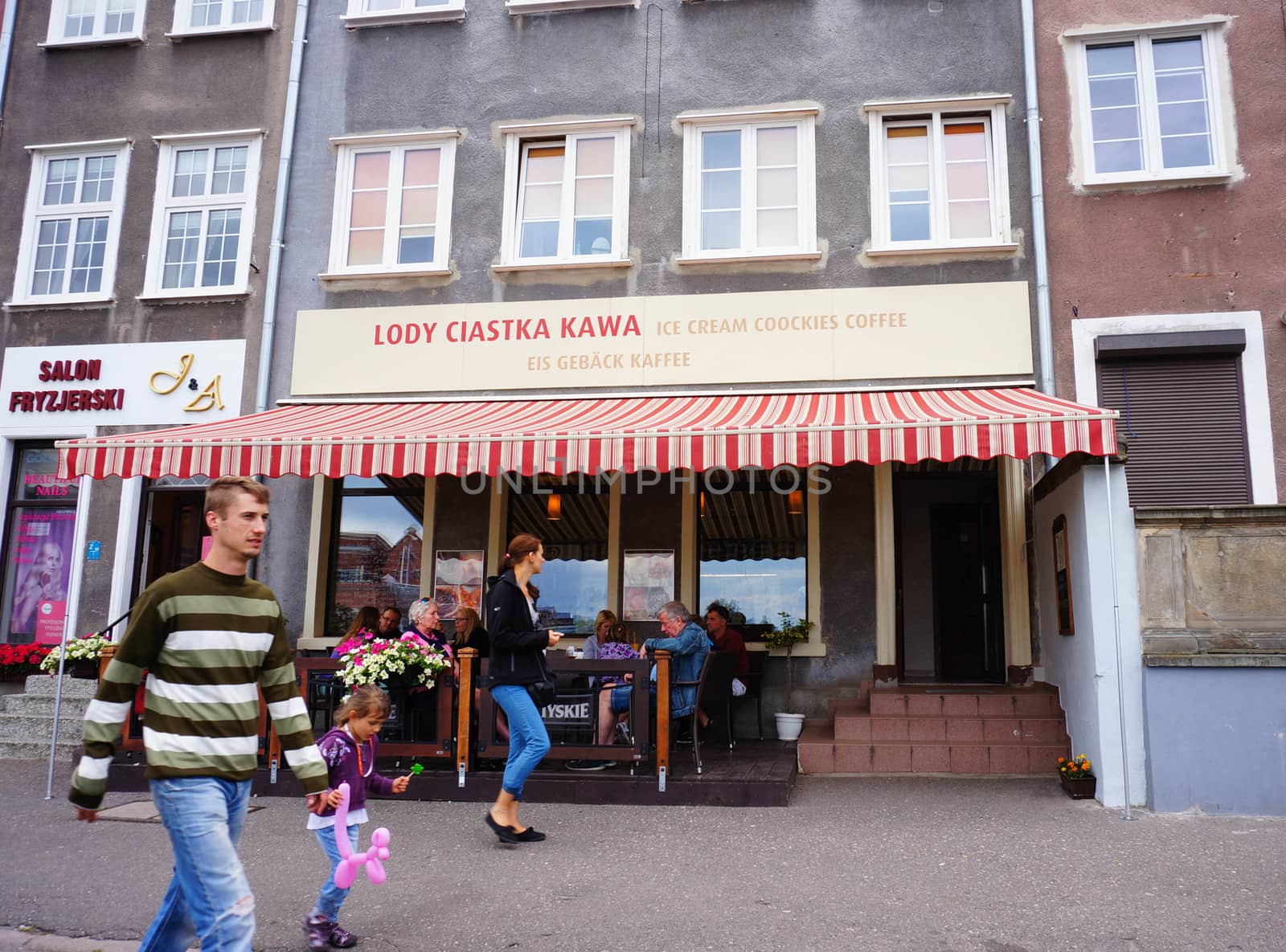 GDANSK, POLAND - JULY 29, 2015: People passing a ice cream bar at the city center