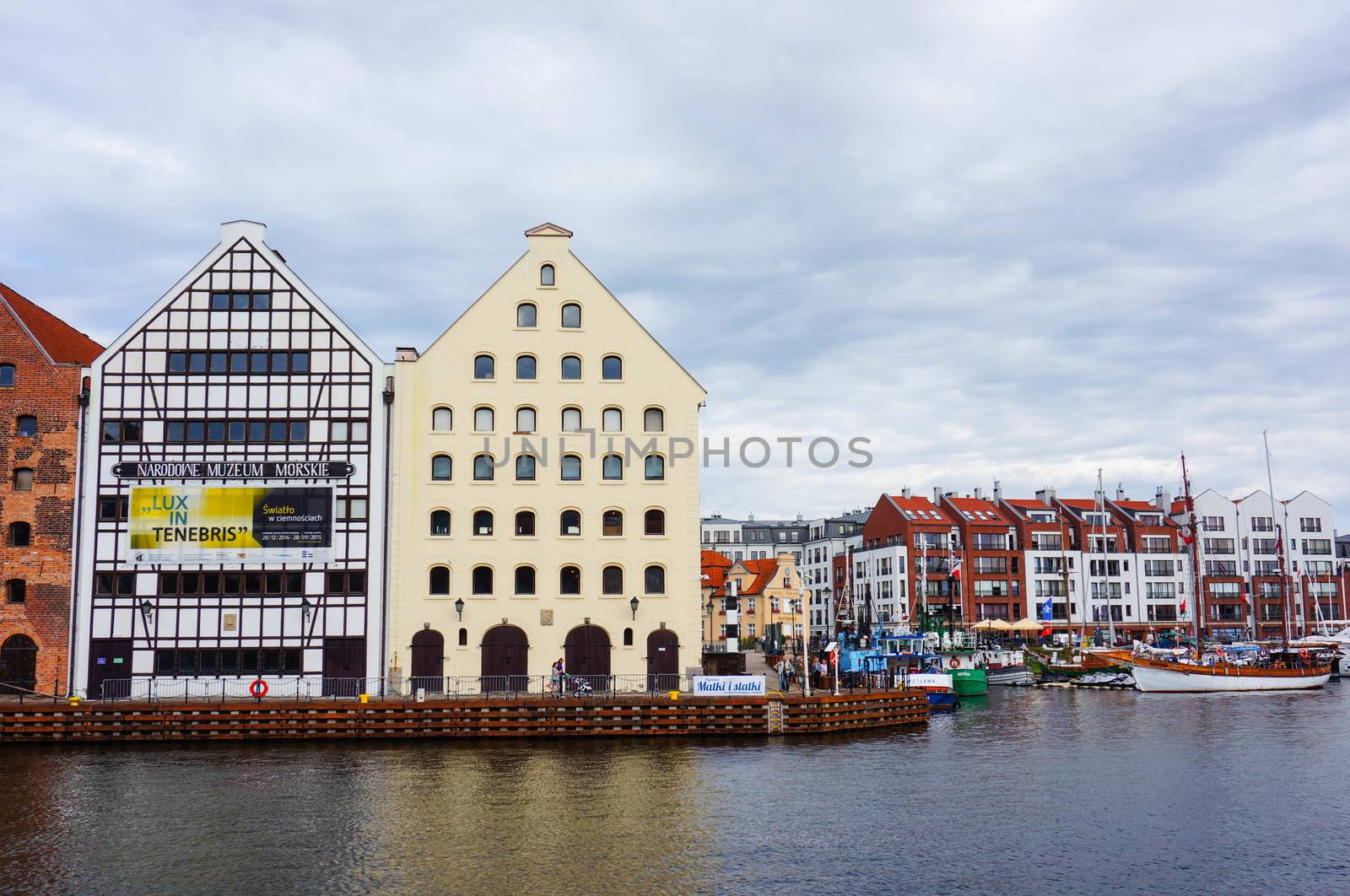 GDANSK, POLAND - JULY 29, 2015: Row of buildings by the Motlawa river in the city center