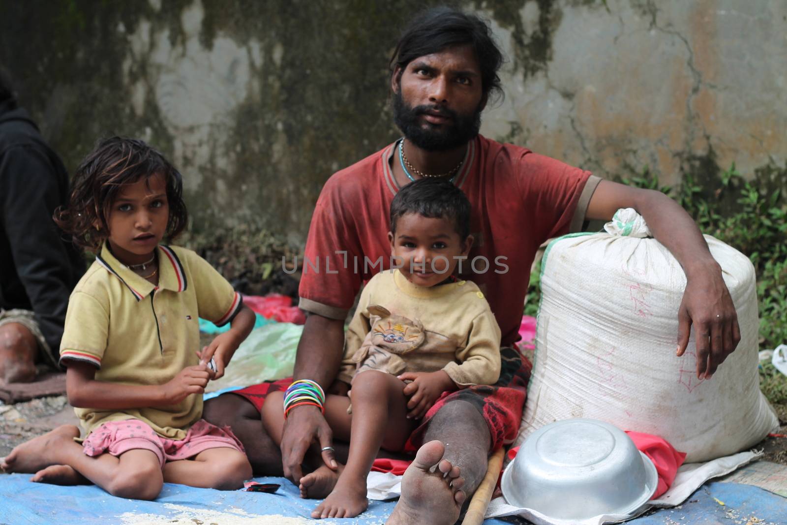 NEPAL: An itinerant Indian family from Bombay photographed in Lalitpur, Godwari in Nepal. Sanjay Singh Ghosle (3) does not go to school and begs on the streets with his father.Mahendra Singh Ghosle gave permission to take the pictures.A collection of pictures by Newzulu photographer Anish Gajurel capturing the hardship of life on the poverty line in Nepal.   