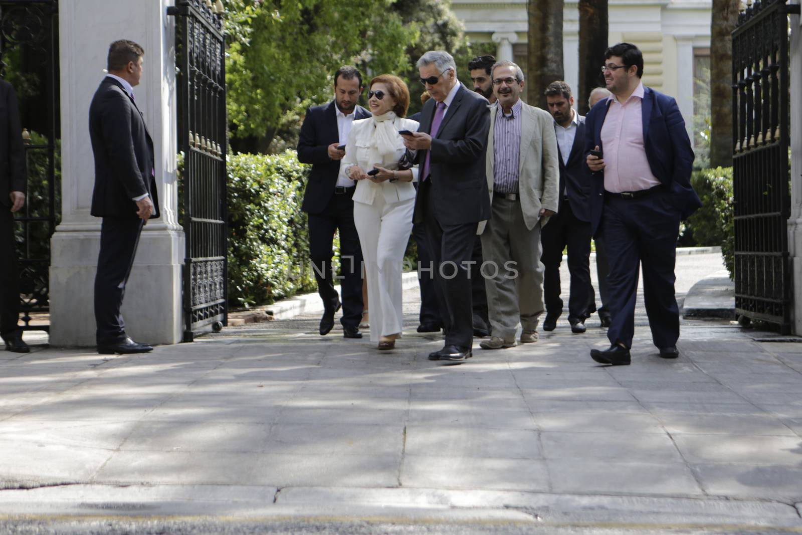 GREECE, Athens: Greek Government ministers leave the Presidential Mansion after the swearing-in ceremony in Athens, Greece on September 23, 2015. The ceremony took place at the Presidential Mansion, three days after the victory of SYRIZA (Coalition of the Radical Left) in the second Greek General Election in eight months.The implementation of the bailout, agreed after months of bitter negotiations, will be the government's overwhelming task.