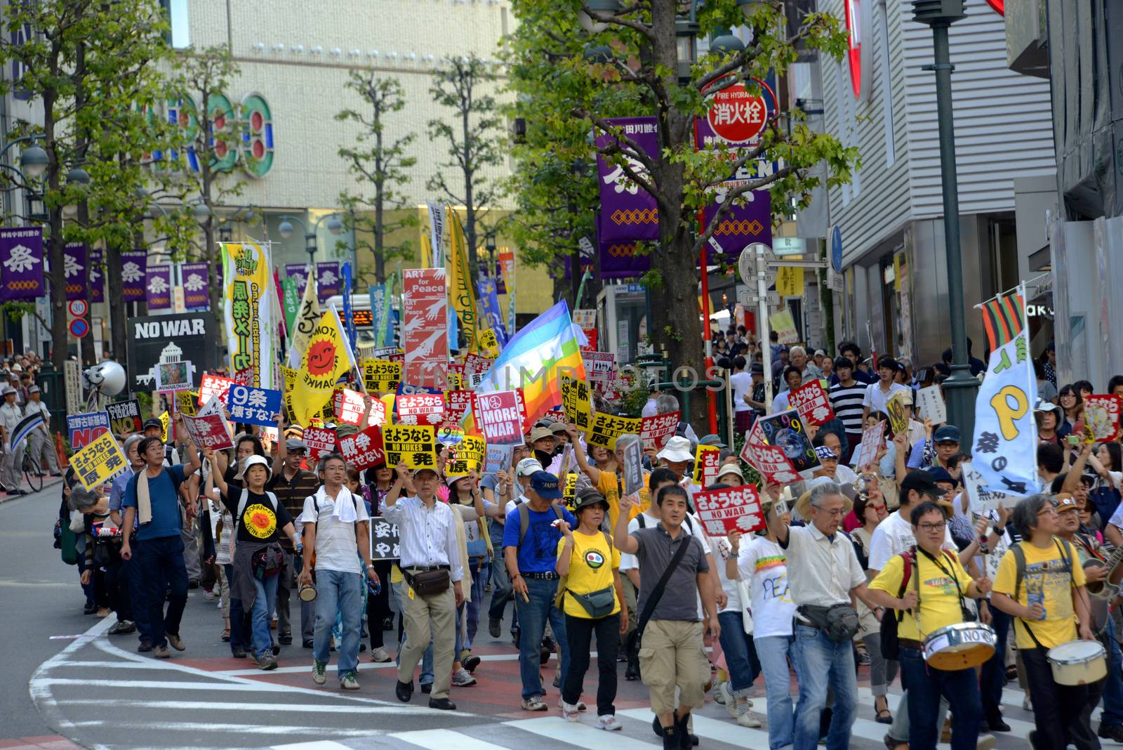 JAPAN, Tokyo : Thousands of people protest in Tokyo outside of Japan's parliament against new legislation that would allow the military to deploy overseas on September 23, 2015. The changes would allow Japanese troops to fight abroad for the first time since World War Two. 