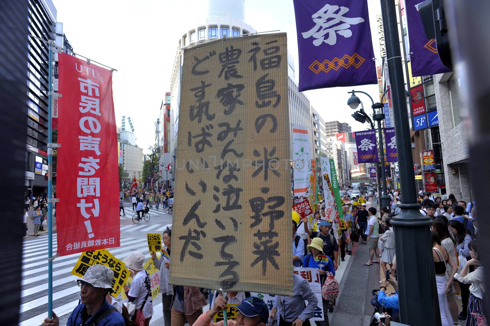 JAPAN, Tokyo : Thousands of people protest in Tokyo outside of Japan's parliament against new legislation that would allow the military to deploy overseas on September 23, 2015. The changes would allow Japanese troops to fight abroad for the first time since World War Two. 
