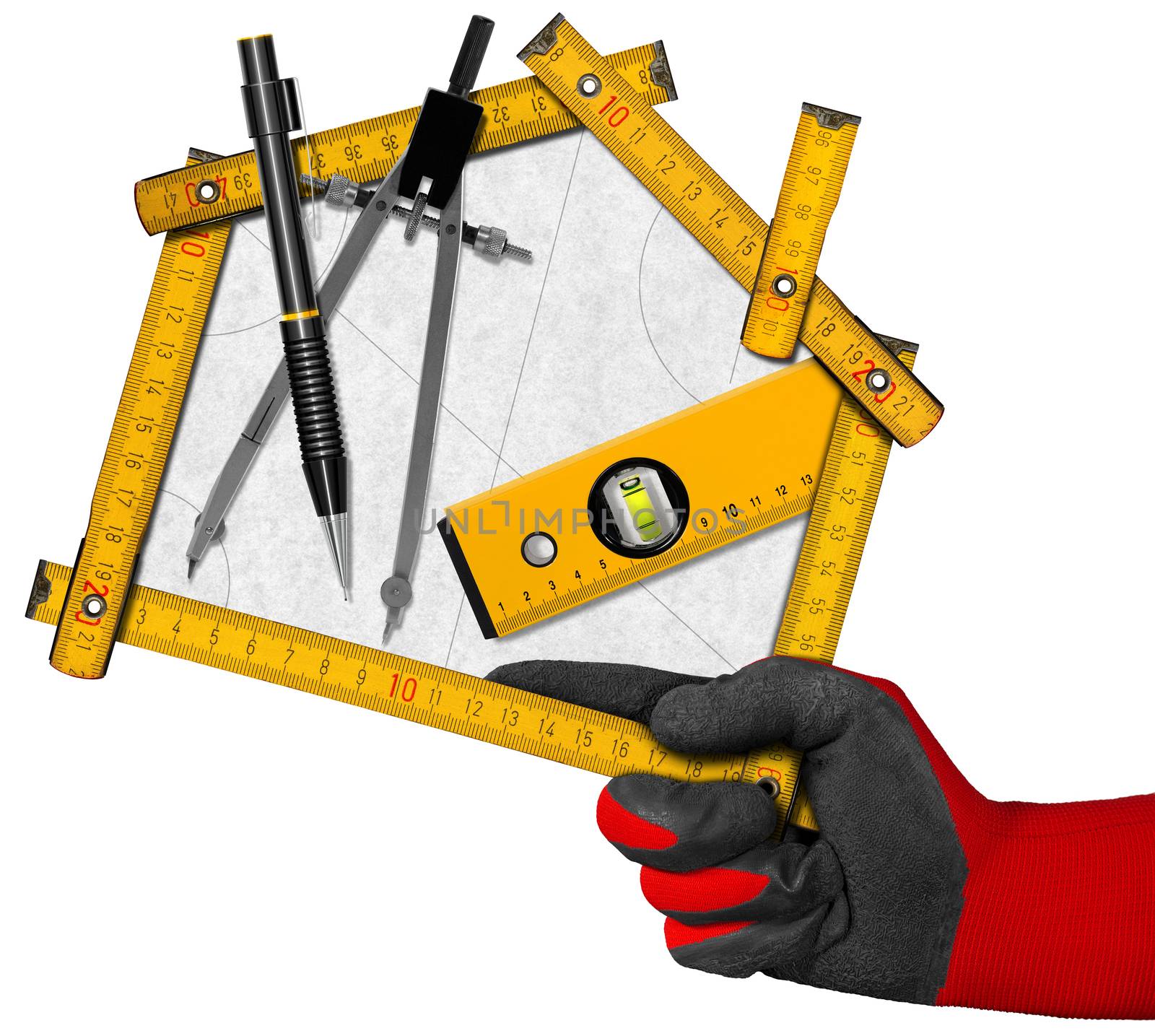 Hand holding a wooden meter ruler in the shape of house with a pencil, drawing compass and a spirit level on a white paper. Concept of house project 