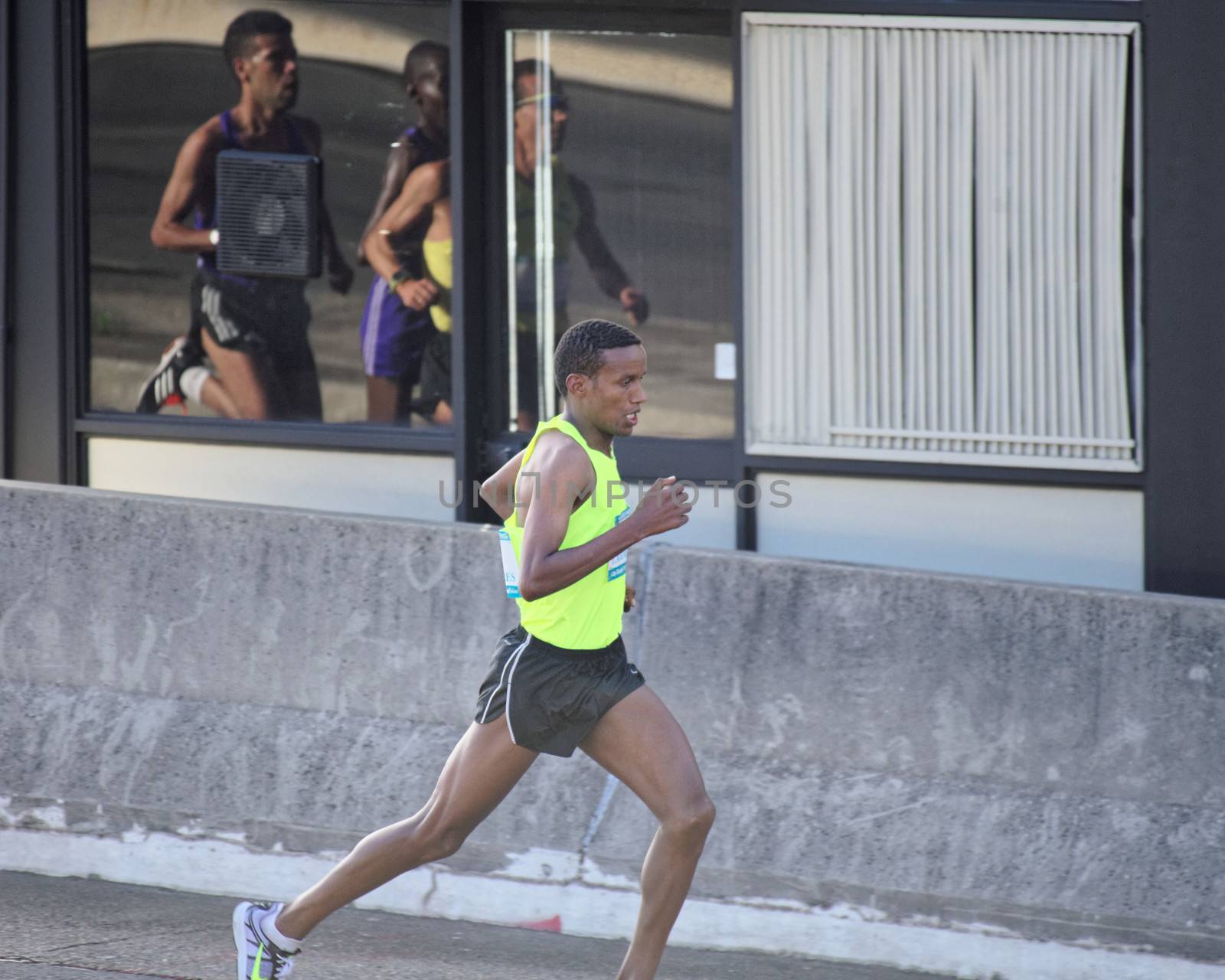 AUSTRALIA, Sydney: Ethiopian Gebo Burka attempts to defend his title during the Sydney Marathon held as part of the Sydney Running Festival on September 20, 2015. Around 30,000 participants took part in the 15th Sydney Running Festival which incorporates a 42km marathon, a half marathon, a 9km bridge run as well as a 3.5km family fun run