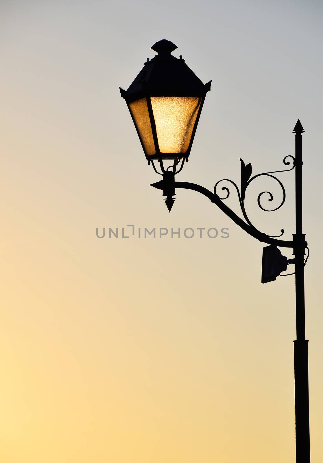 Street antique style lamp post with effect of shine from low lig by BreakingTheWalls