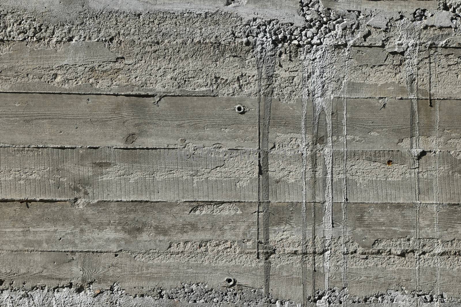 Concrete wall with wooden pattern impress from wooden form board by BreakingTheWalls