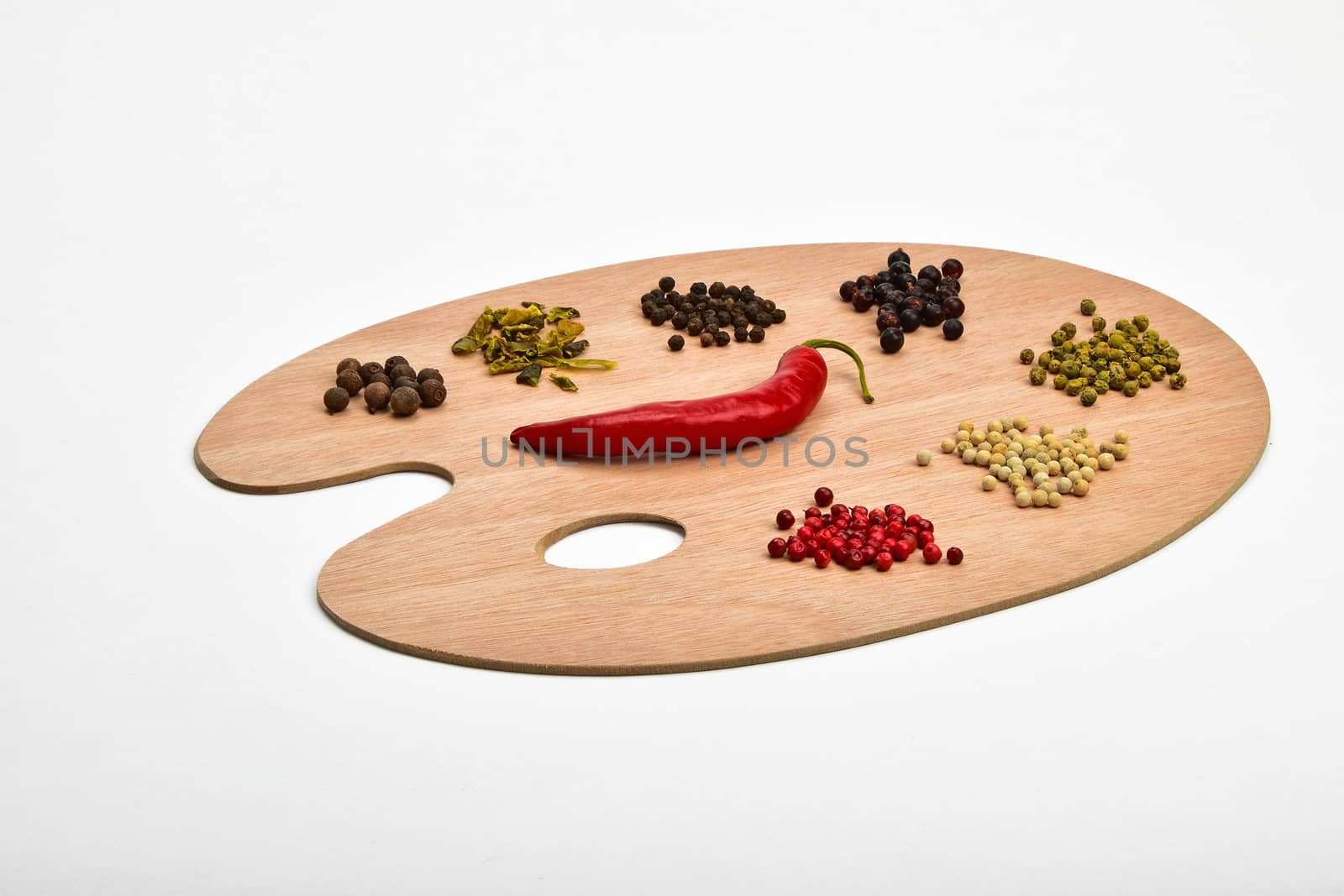 Palette of spices, collection of various spices on wooden palette isolated on white