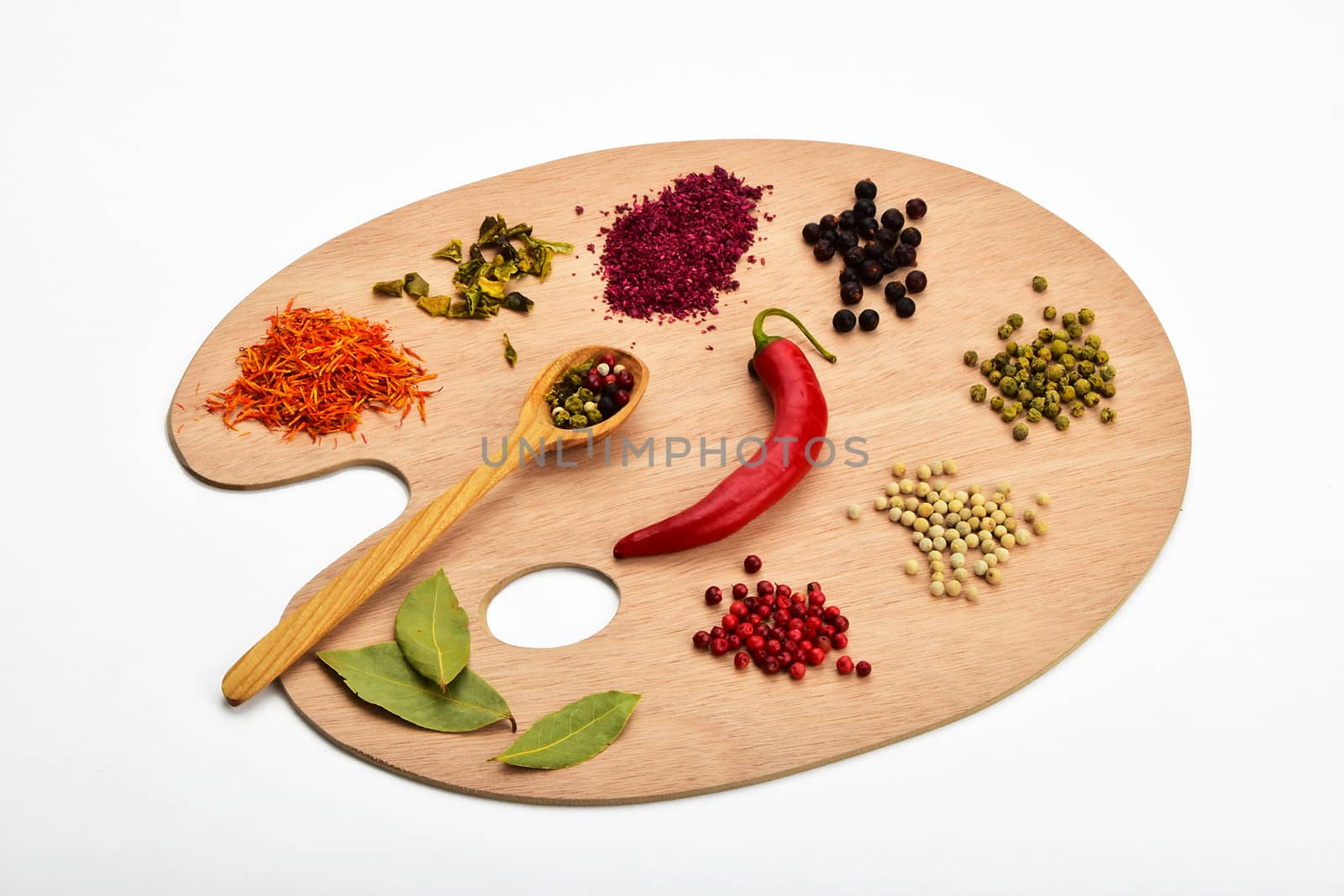 Palette of spices, collection of various spices on wooden palette isolated on white