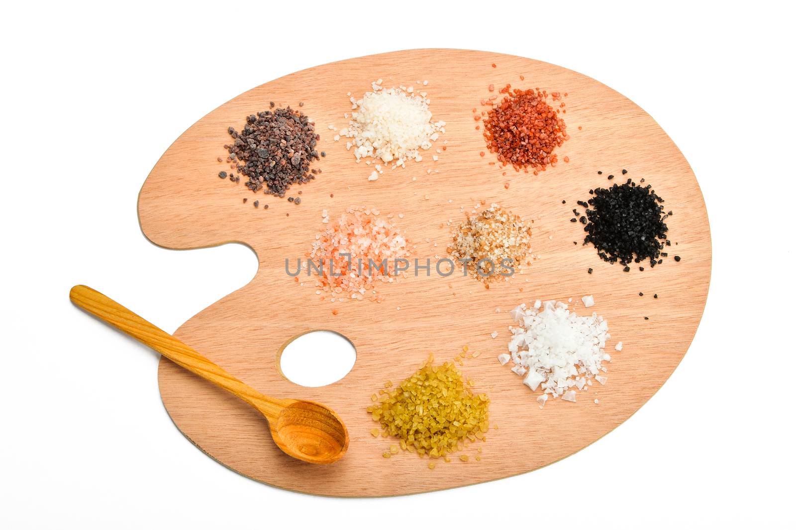 Palette of salt, collection of various salts on wooden palette isolated on white