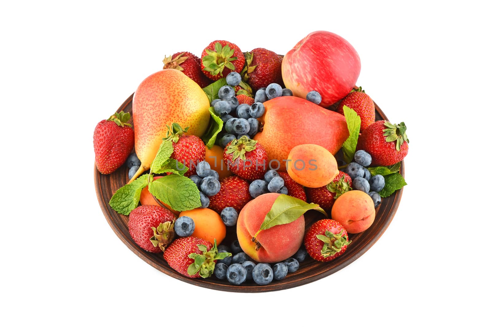 Fruits and berries mix in ceramic plate isolated on white by BreakingTheWalls