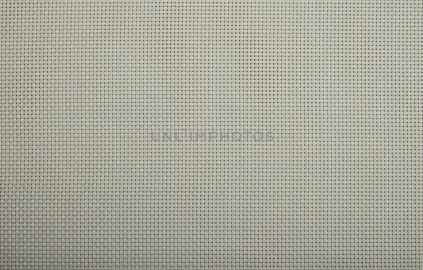 Background texture of grey wicker braided plastic double strings with small mesh and cyan blue back