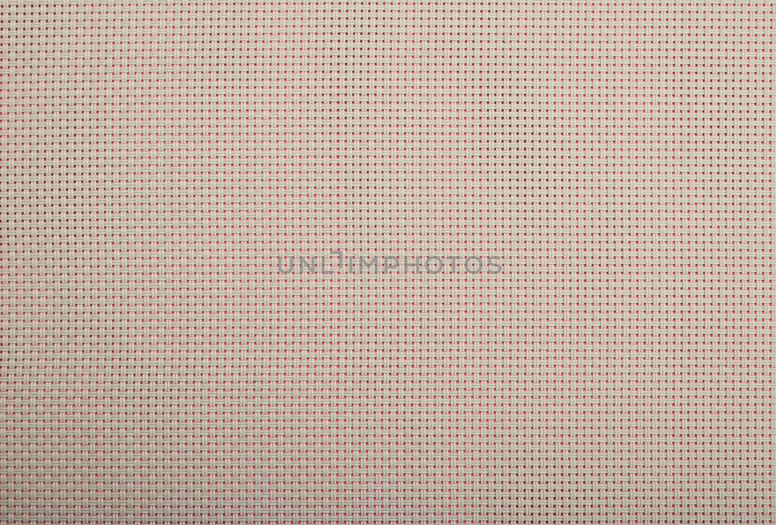 Background texture of grey wicker braided plastic double strings with small mesh and pink back