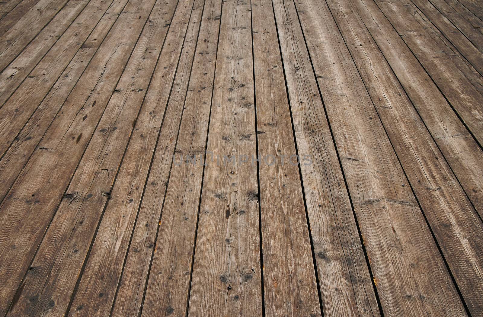 Vintage wooden surface with planks and gaps in perspective by BreakingTheWalls