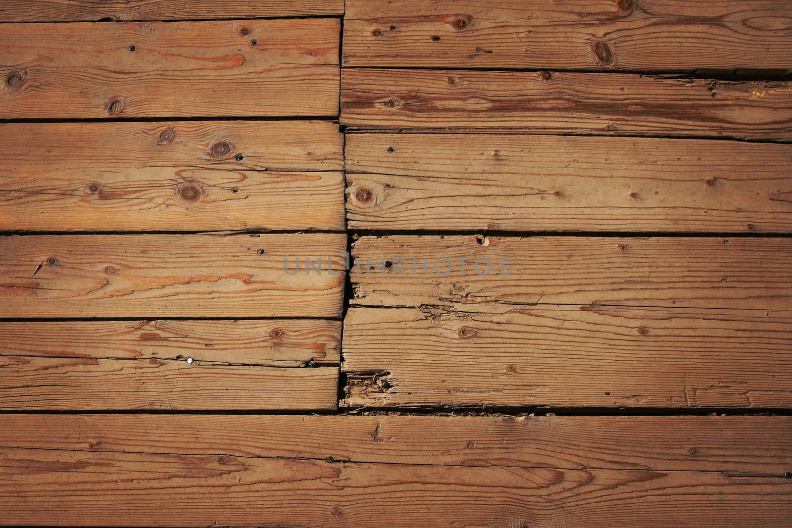 Vintage wooden panel with horizontal planks and gaps with shade by BreakingTheWalls