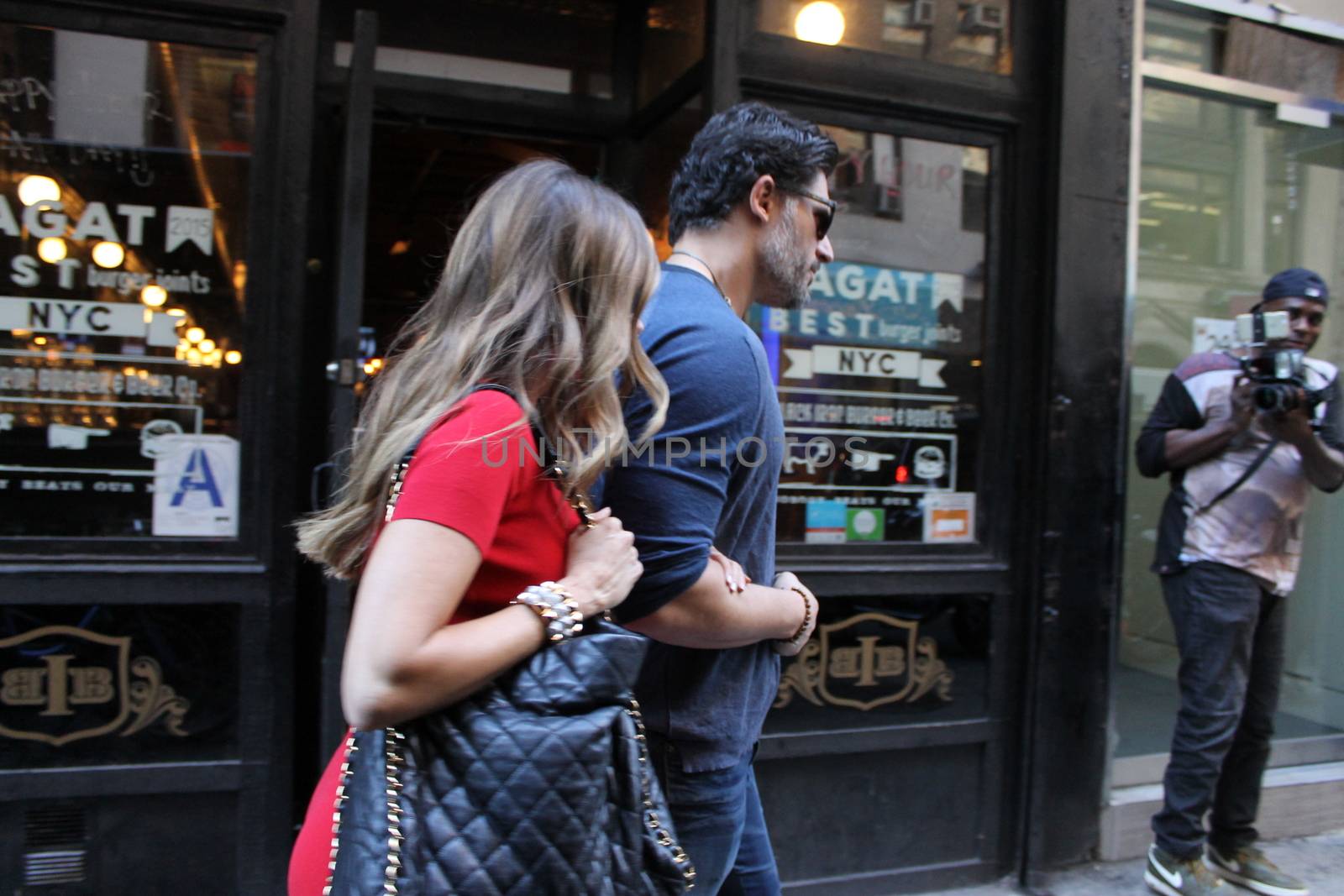 USA, New York: Addicted to cake, vivacious Modern Family superstar Sofia Vergara hurries to her car with Hollywood-hunk fiancee Joe Manganiello after visiting Ron Ben-Israel Cakes in Midtown Manhattan on September 23, 2015. Bakery staff confirmed that the super couple was at the shop; but when asked if the pair had decided to buy their wedding cake from the bakery, one employee revealed that it was all up in the air.