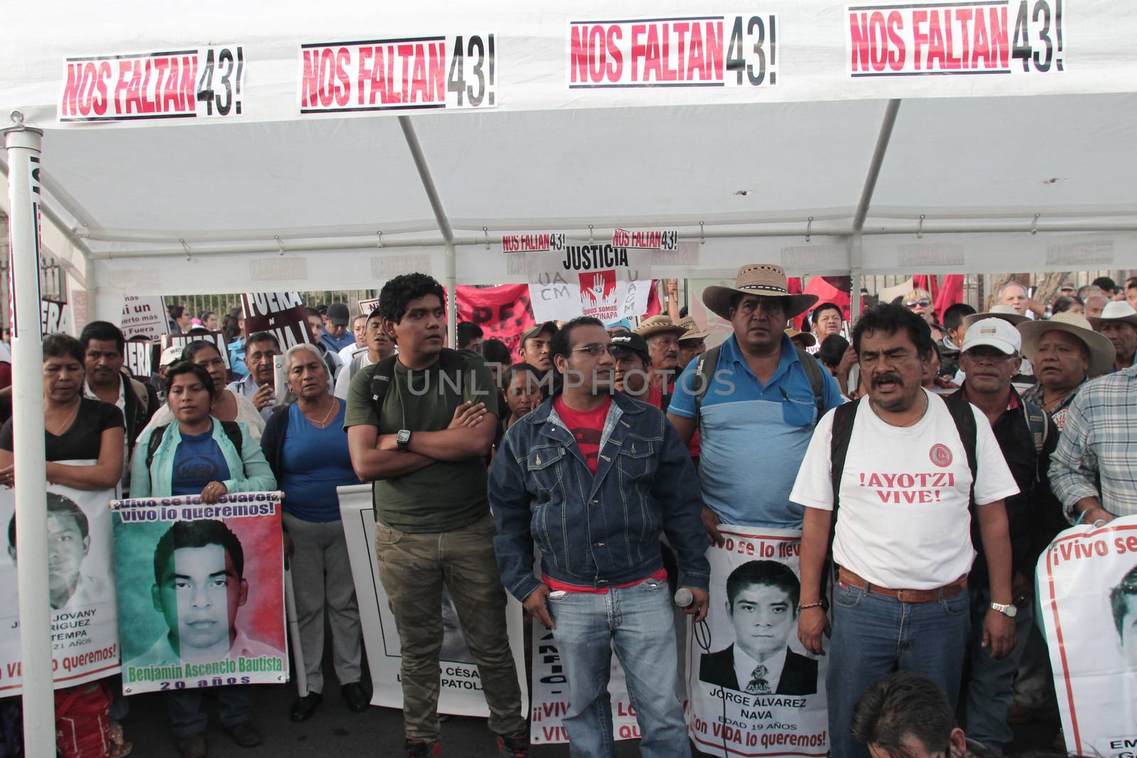 MEXICO, Mexico City : Fathers and relatives of the 43 missing students from Ayotzinapa arrive at Zocalo Square in Mexico City on September 23, 2015. Parents of 43 Mexican students who disappeared last year began a 43-hour hunger strike on Wednesday, a day before meeting with President Enrique Pena Nieto ahead of the case's anniversary.