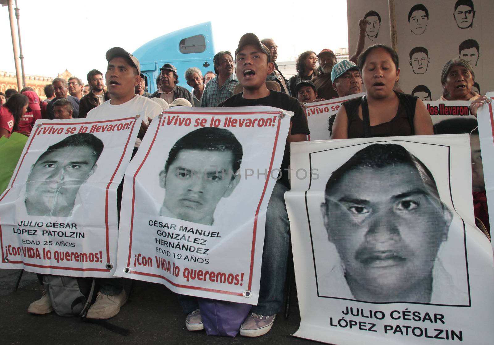 MEXICO, Mexico City : Fathers and relatives of the 43 missing students from Ayotzinapa arrive at Zocalo Square in Mexico City on September 23, 2015. Parents of 43 Mexican students who disappeared last year began a 43-hour hunger strike on Wednesday, a day before meeting with President Enrique Pena Nieto ahead of the case's anniversary.