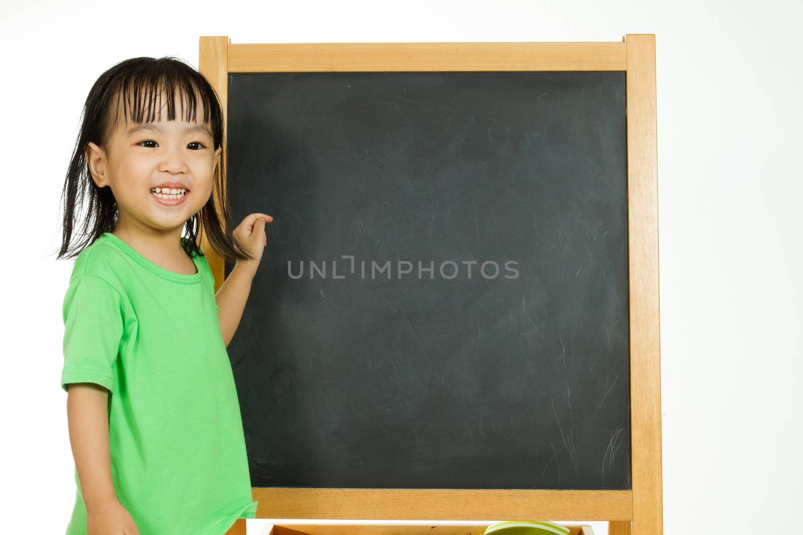 Chinese little girl with blank blackboard by kiankhoon