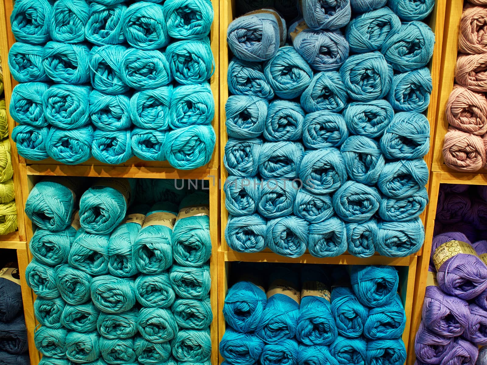 Selection of coloful yarn wool on display in a shop     