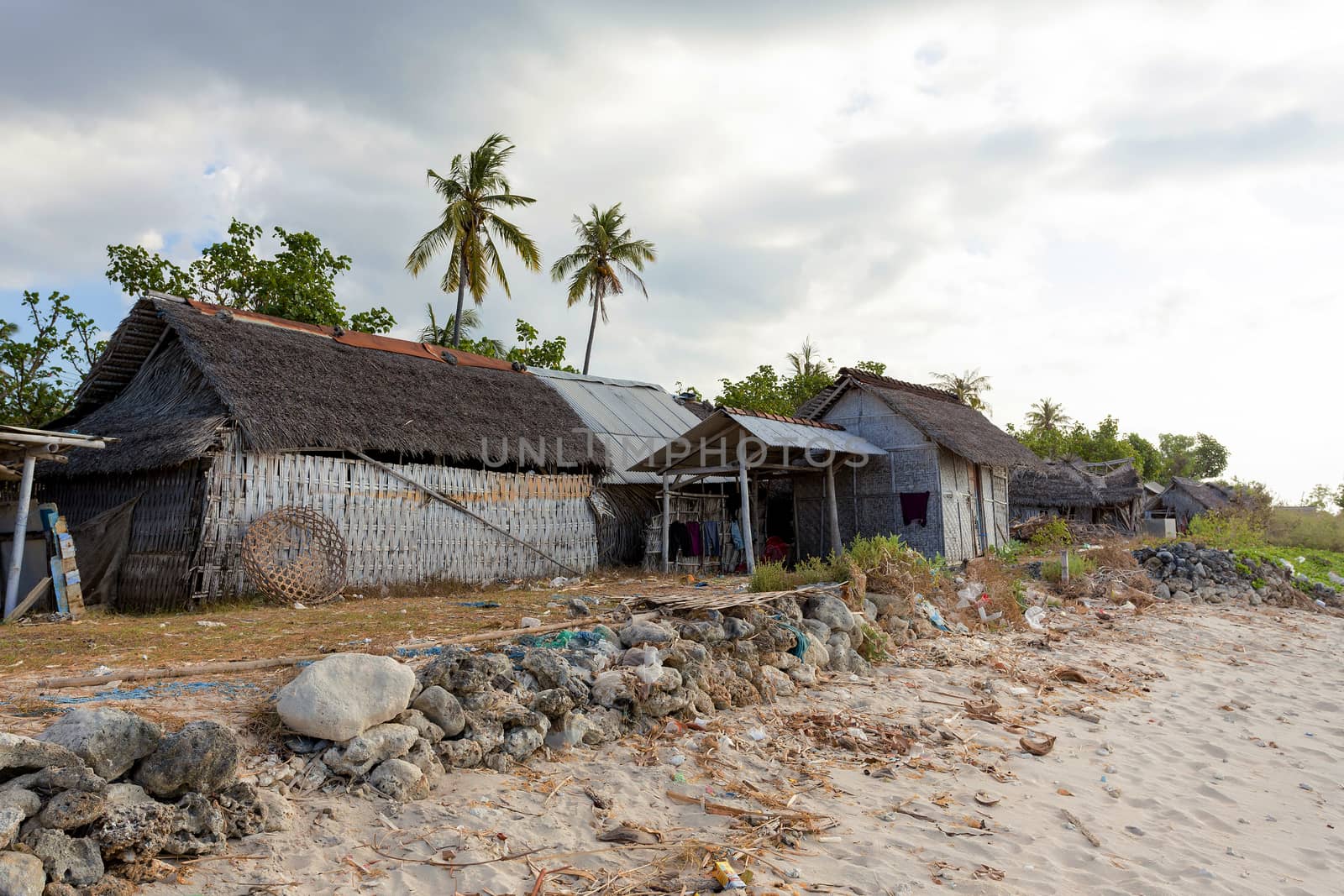 poor huts of the natives, traditional indonesian poor house - shack on beach, Nusa Penida Island, Toyapakeh. Bali.