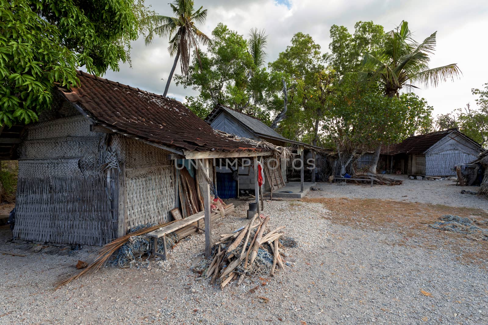 poor huts of the natives, traditional indonesian poor house - shack on beach, Nusa Penida Island, Toyapakeh. Bali.