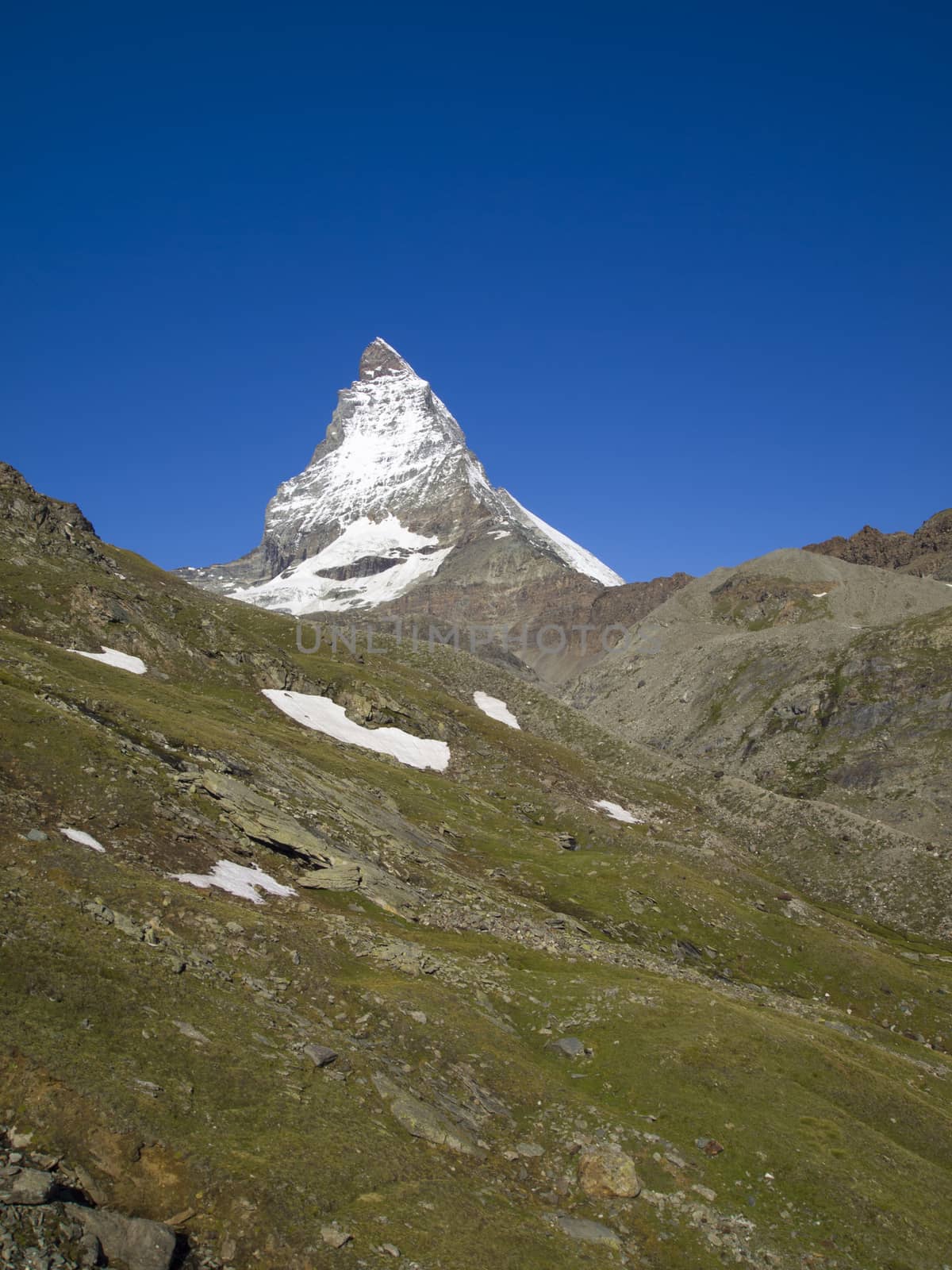 Matterhorn mountain in the Pennine Alps on the border between Switzerland and Italy. Its summit is 4,478 metres (14,692 ft) high, making it one of the highest peaks in the Alps