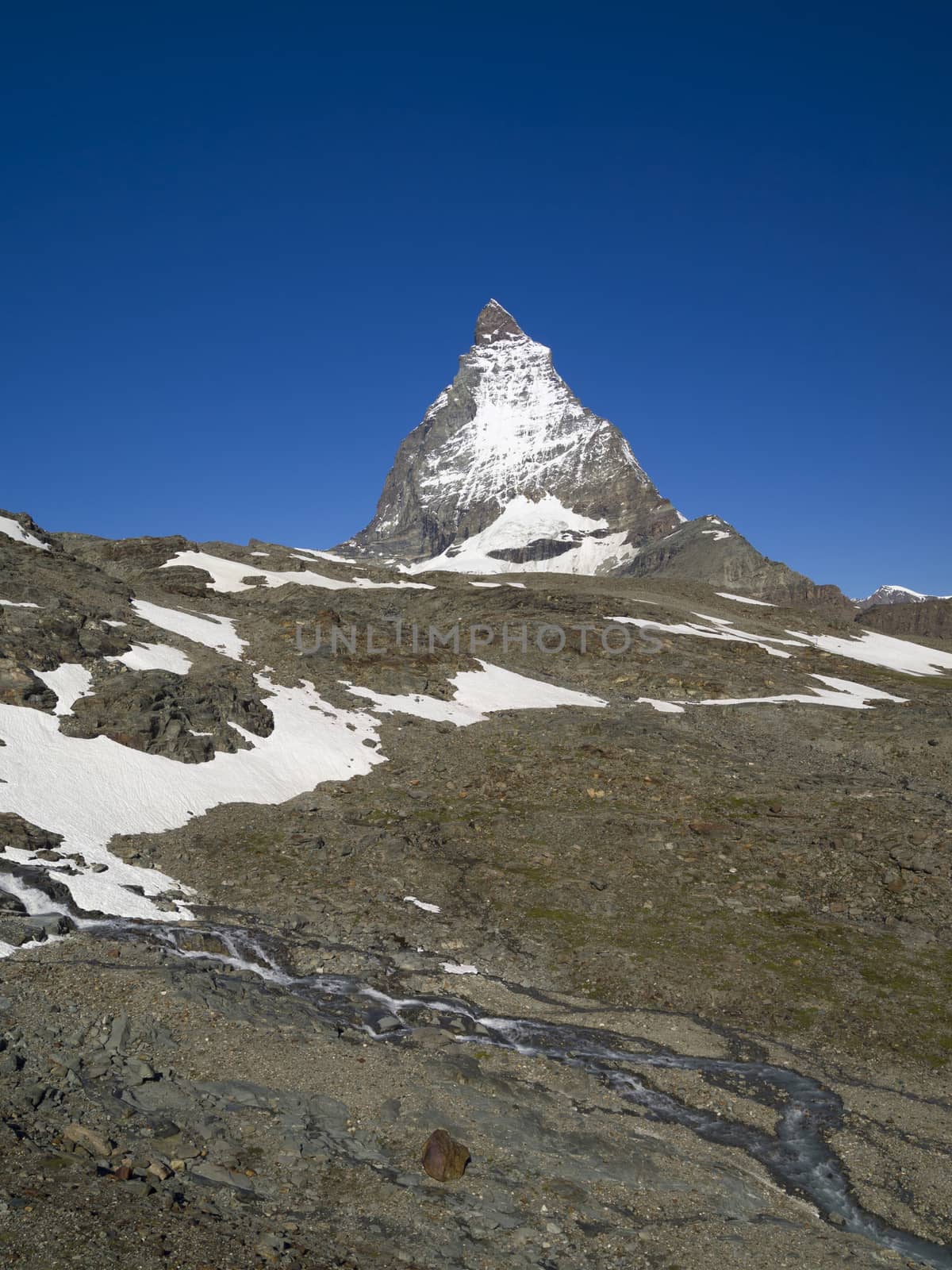 Matterhorn mountain in the Pennine Alps on the border between Switzerland and Italy. Its summit is 4,478 metres (14,692 ft) high, making it one of the highest peaks in the Alps