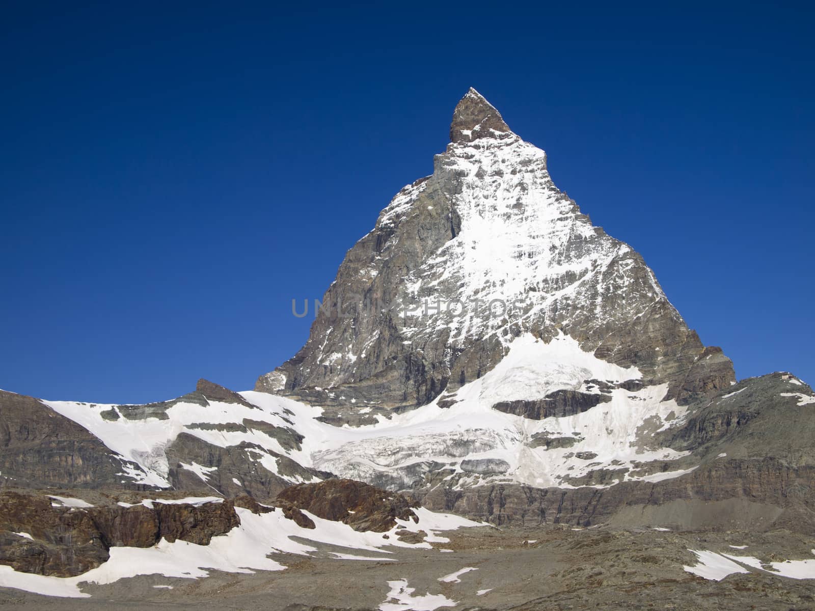 Matterhorn mountain in the Pennine Alps on the border between Switzerland and Italy. Its summit is 4,478 metres (14,692 ft) high, making it one of the highest peaks in the Alps