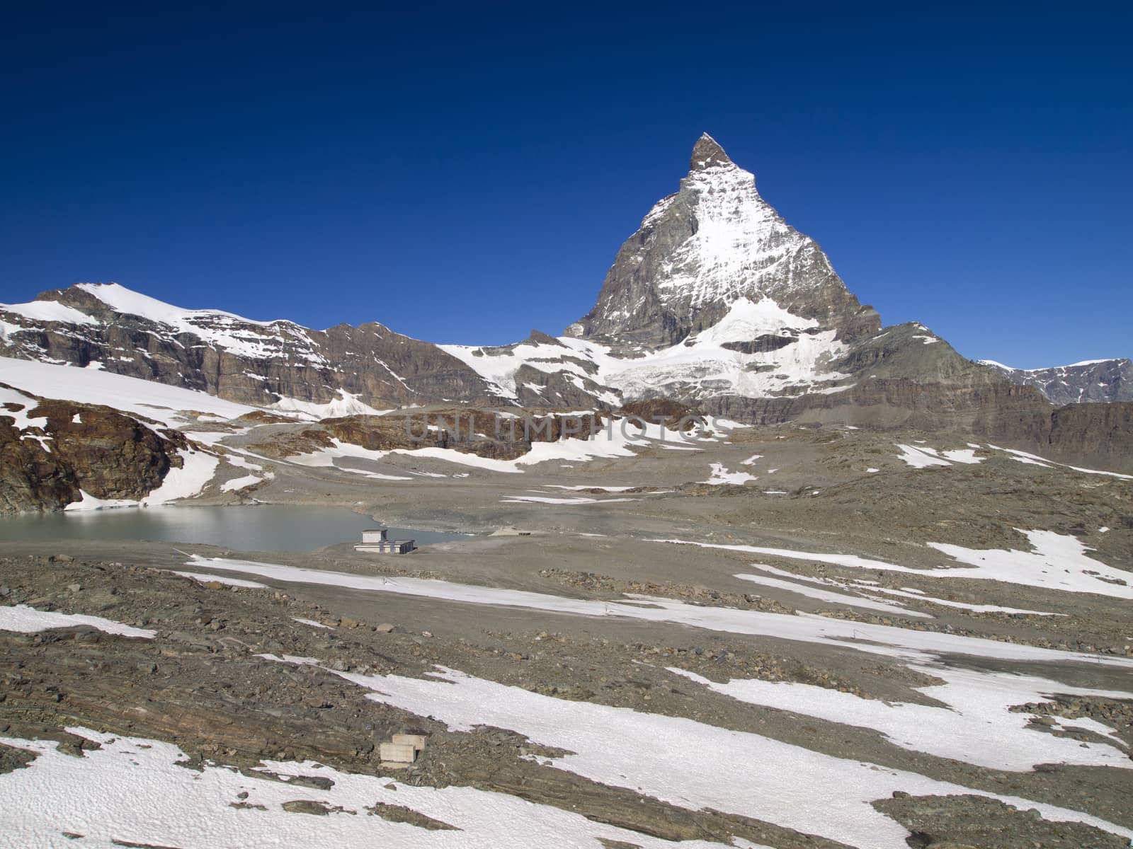 Matterhorn mountain in the Pennine Alps on the border between Switzerland and Italy. Its summit is 4,478 metres (14,692 ft) high, making it one of the highest peaks in the Alps