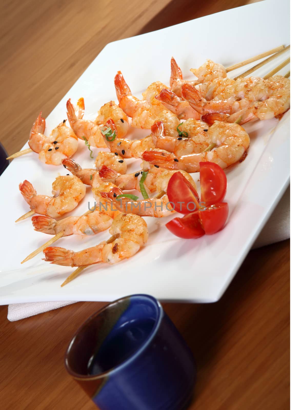 shrimp skewers on rectangular plate