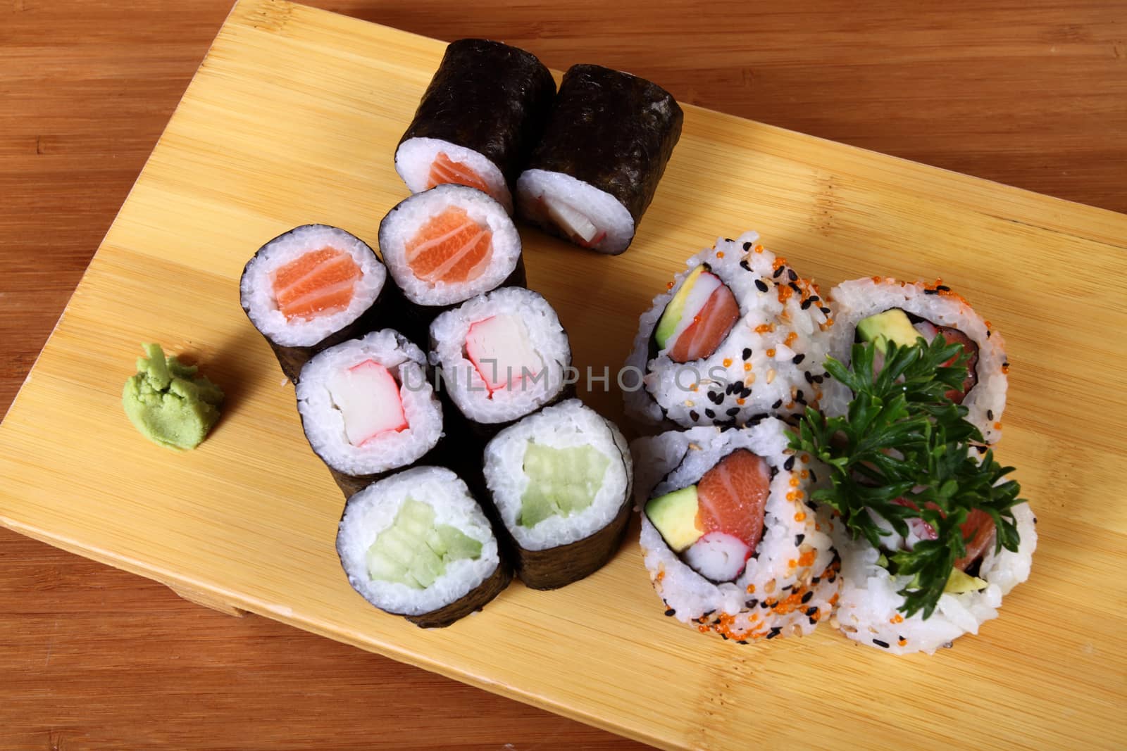 sushi on wood plate